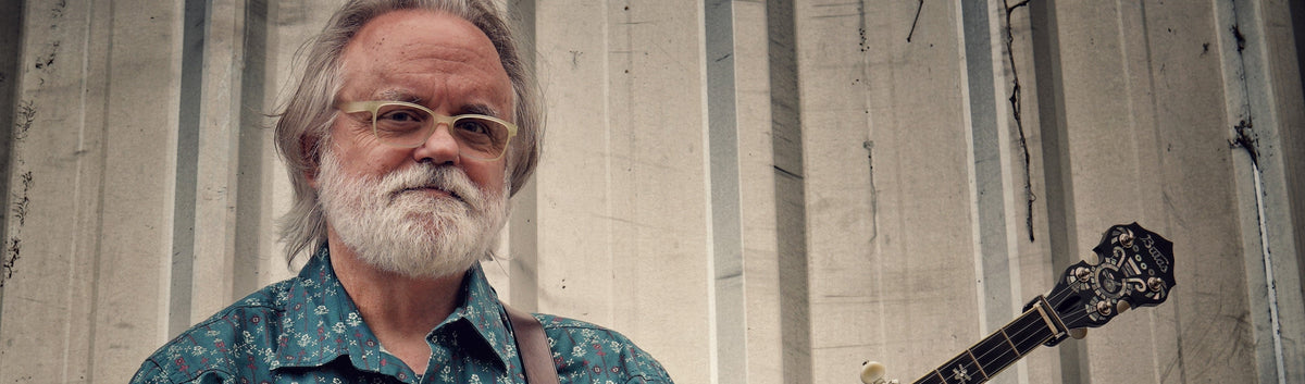 Jim Pankey holding his banjo