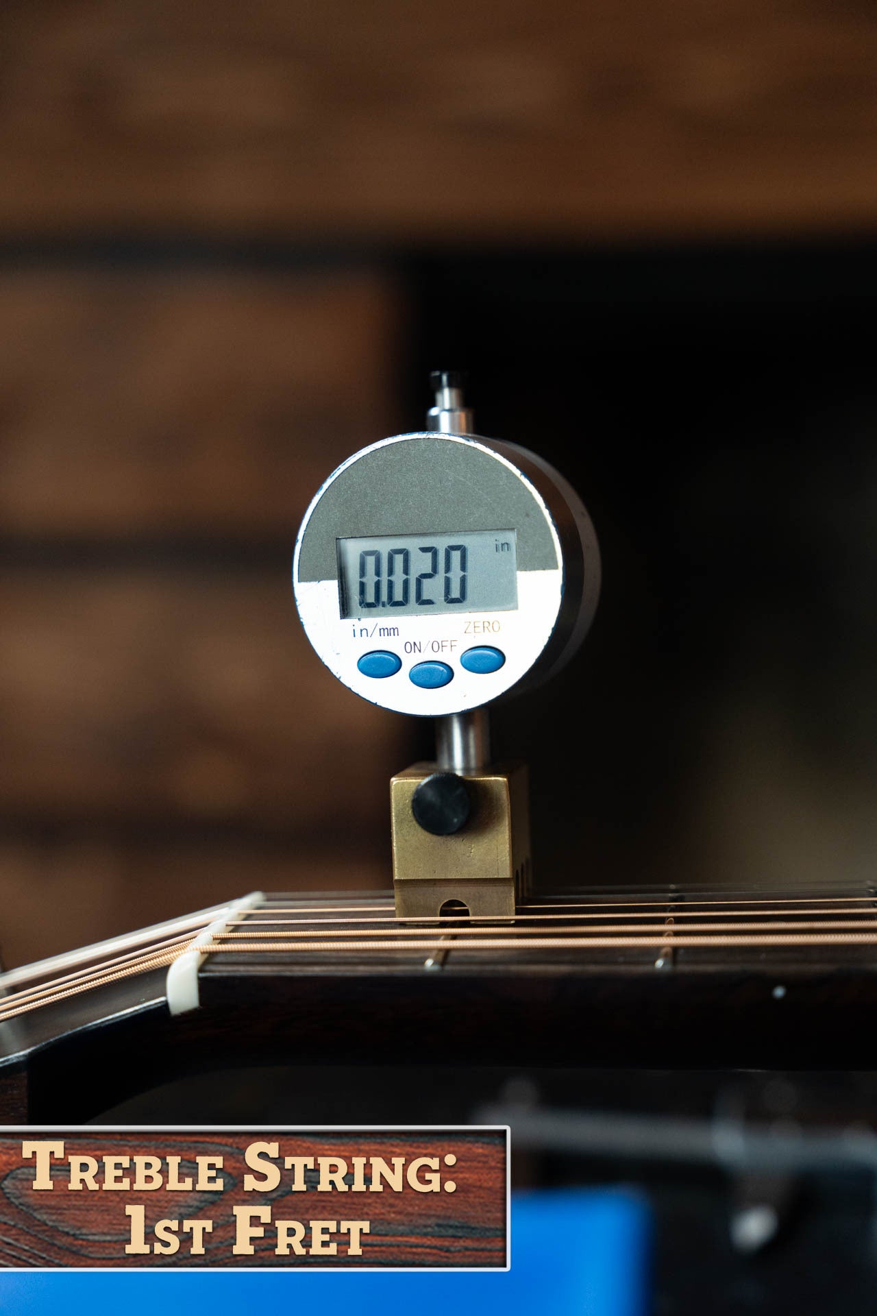 A digital gauge measures 0.020 inches above the 1st fret of a Bourgeois PSN-SD-S Slope Shoulder Dreadnought (#1174) by Boucher Guitars, with “Treble String: 1st Fret” shown—ideal for precise guitar setup.