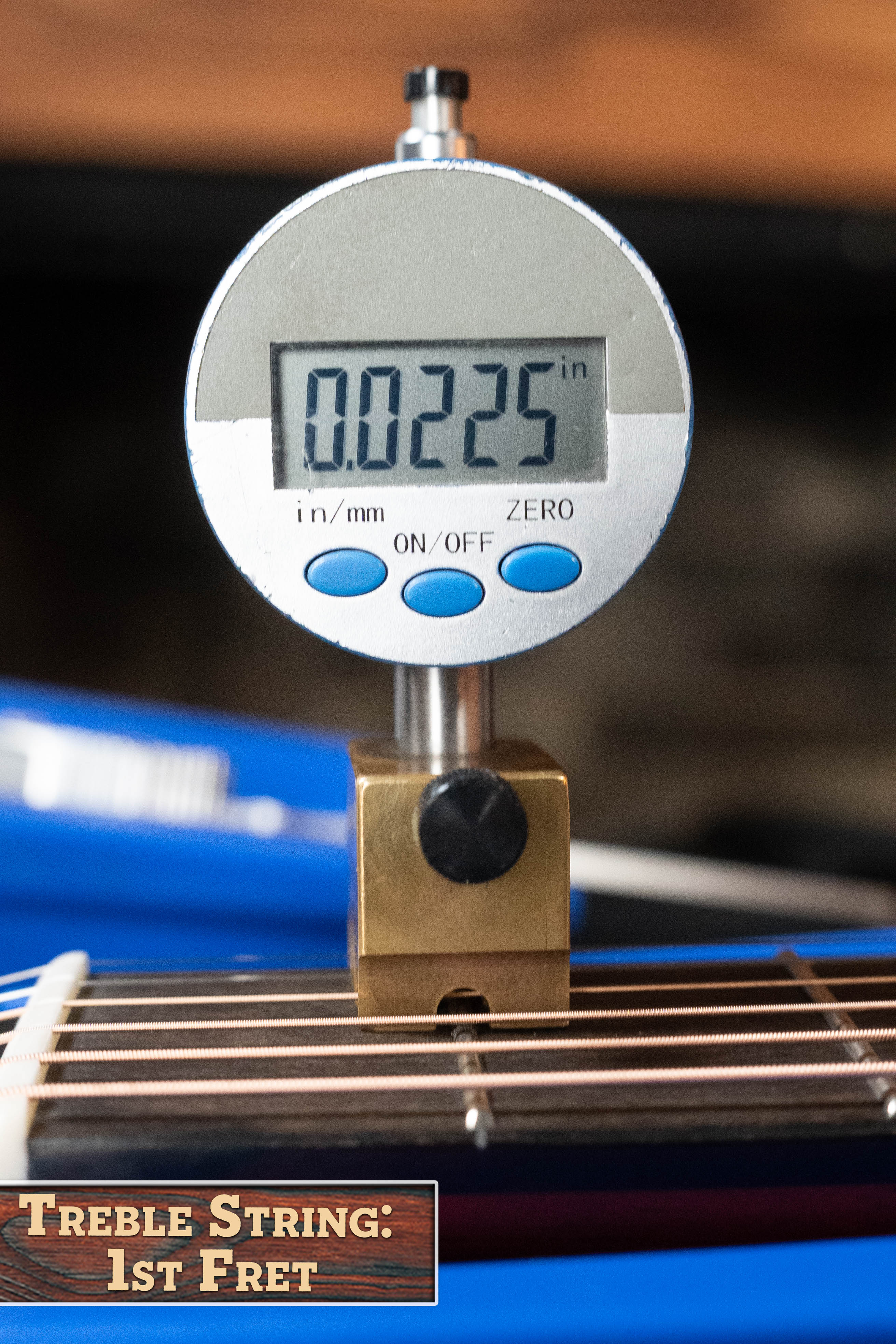 A digital gauge shows the treble string height at the 1st fret of an Eastman Guitars E2D-DLX-SB Cedar/Sapele Sunburst Dreadnought w/Fishman Pickup #1532 as 0.0225 inches; label reads: Treble String: 1st Fret.
