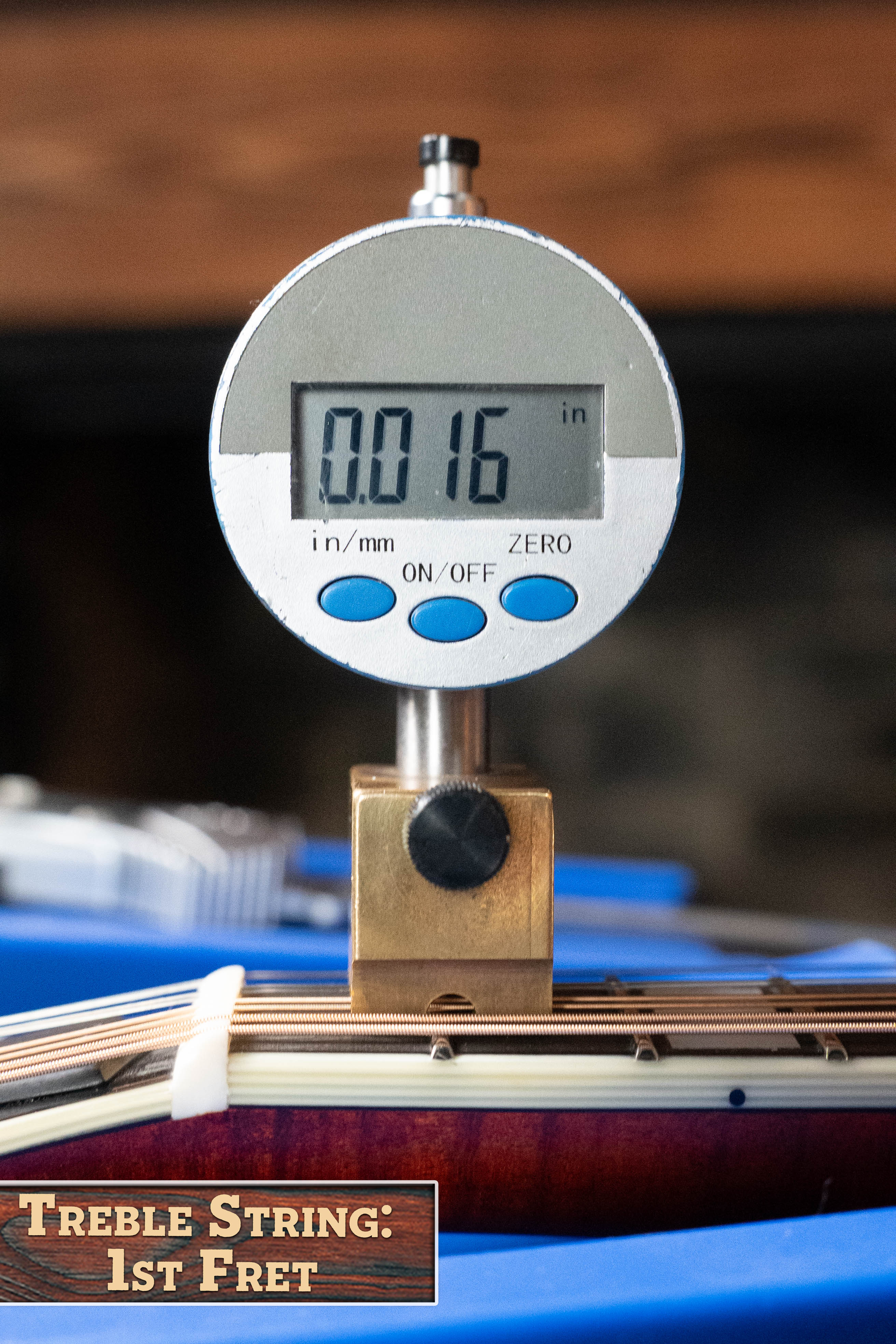 A digital gauge shows 0.016" string height at the 1st fret of the Eastman Guitars MD615 Spruce/Maple F-Style Mandolin w/K&K Pickup #3918. Label: Treble String, 1st Fret.