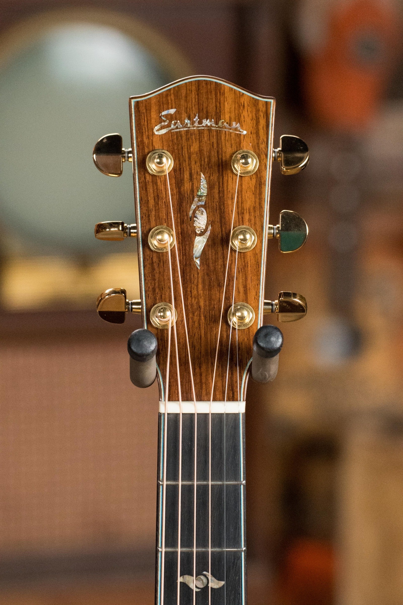 Eastman AC722CE-DF acoustic guitar headstock with rosewood finish and gold tuning pegs. - Eastman AC722CE-DF European Spruce/Rosewood Dakota Fade Finish Grand Auditorium w/ LR Baggs Pickup #6872 - Default Title
