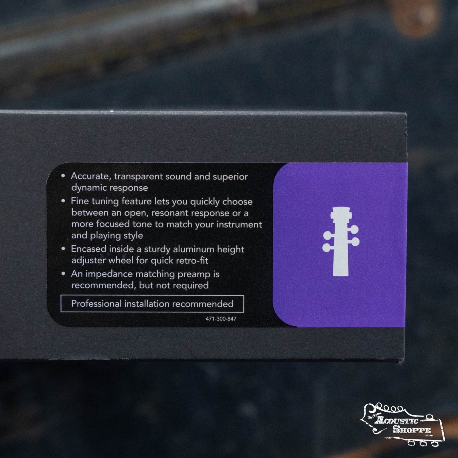 A product box displays Fishman's Full Circle Upright Bass Pickup (PRO-FCL-001) features beside a guitar headstock icon on a purple background, with The Acoustic Shoppe logo in the lower right corner highlighting this acoustic bass upgrade.