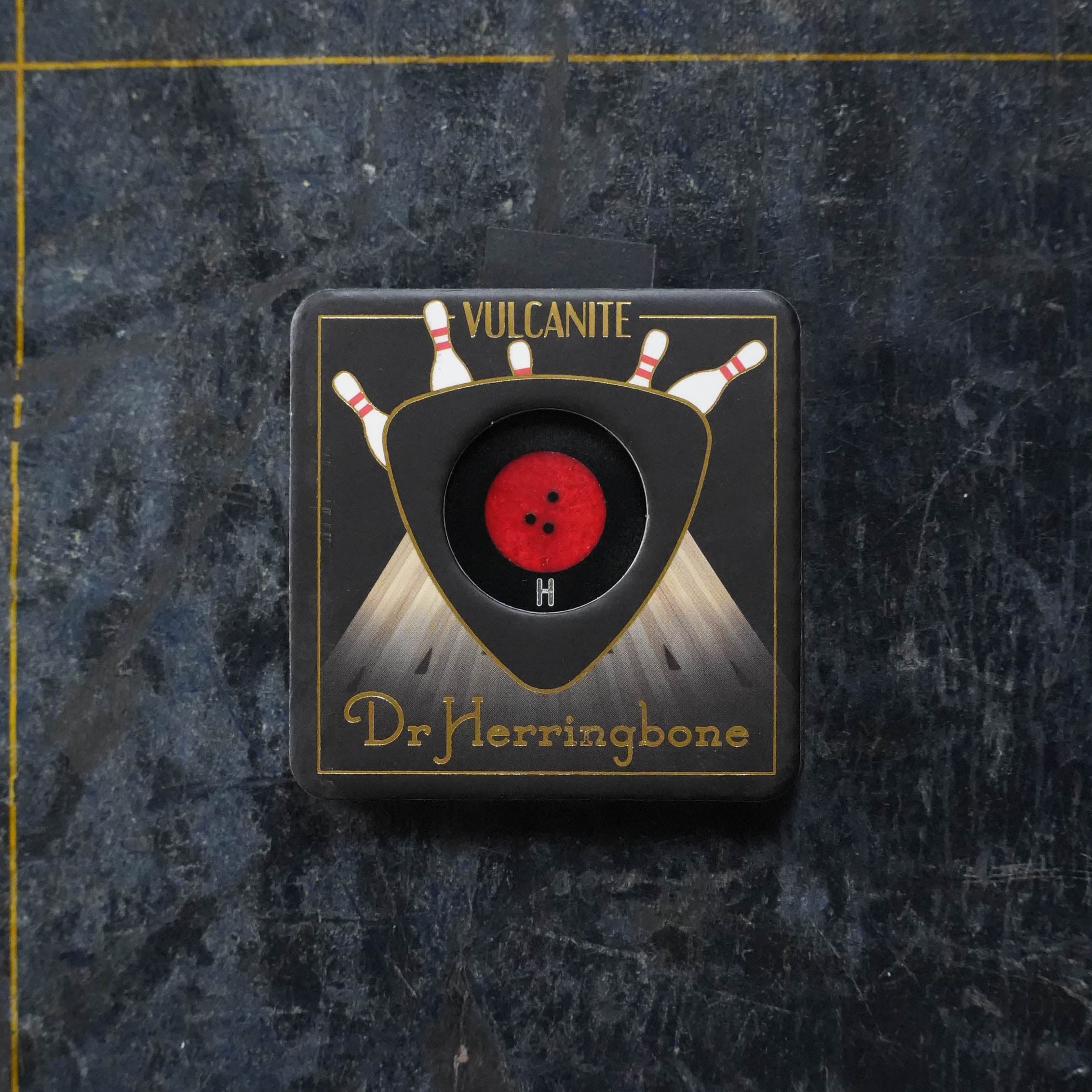 Dr. Herringbone Kingpin Vulcanite Triangle Pick - Heavy