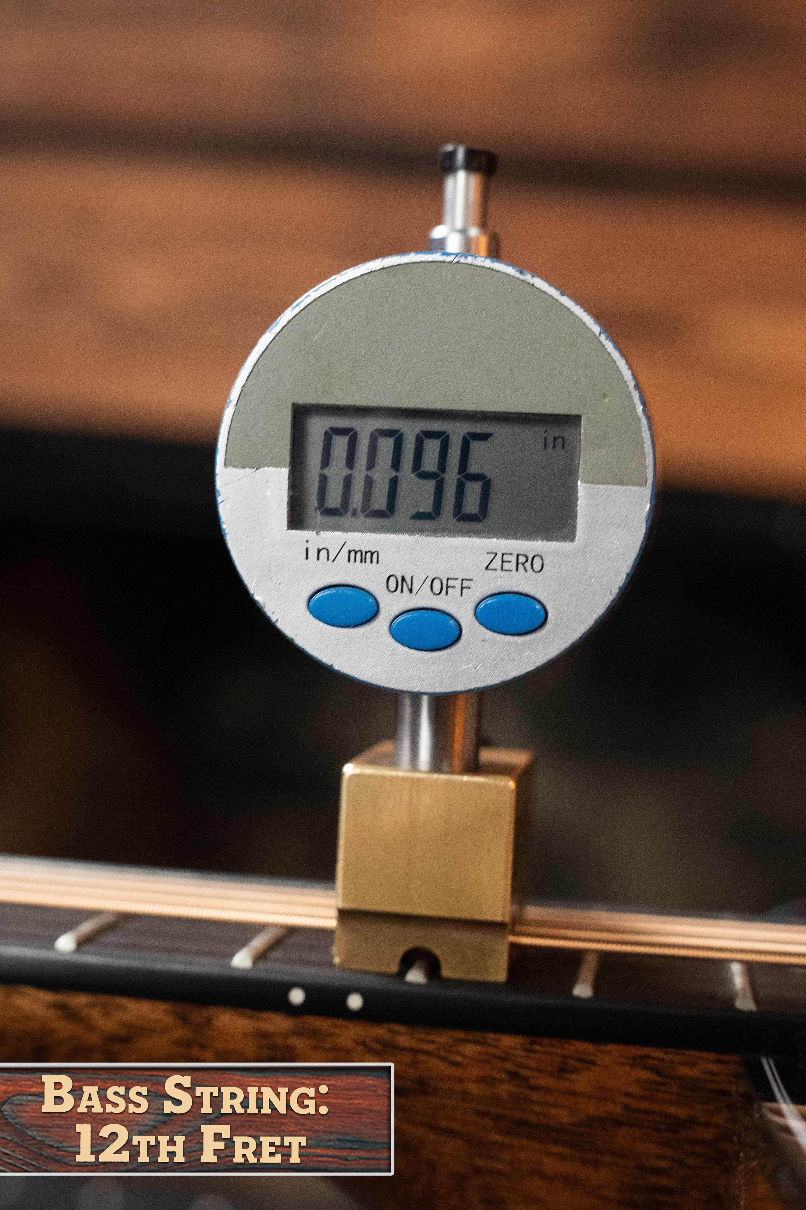 A gauge shows 0.096 inches bass string height at the 12th fret on the *New 2025 Model* Martin D-18 1933 Gloss Ambertone Spruce/Mahogany Dreadnought Acoustic Guitar #6784 by Martin & Co. Bottom left label: Bass String: 12th Fret.