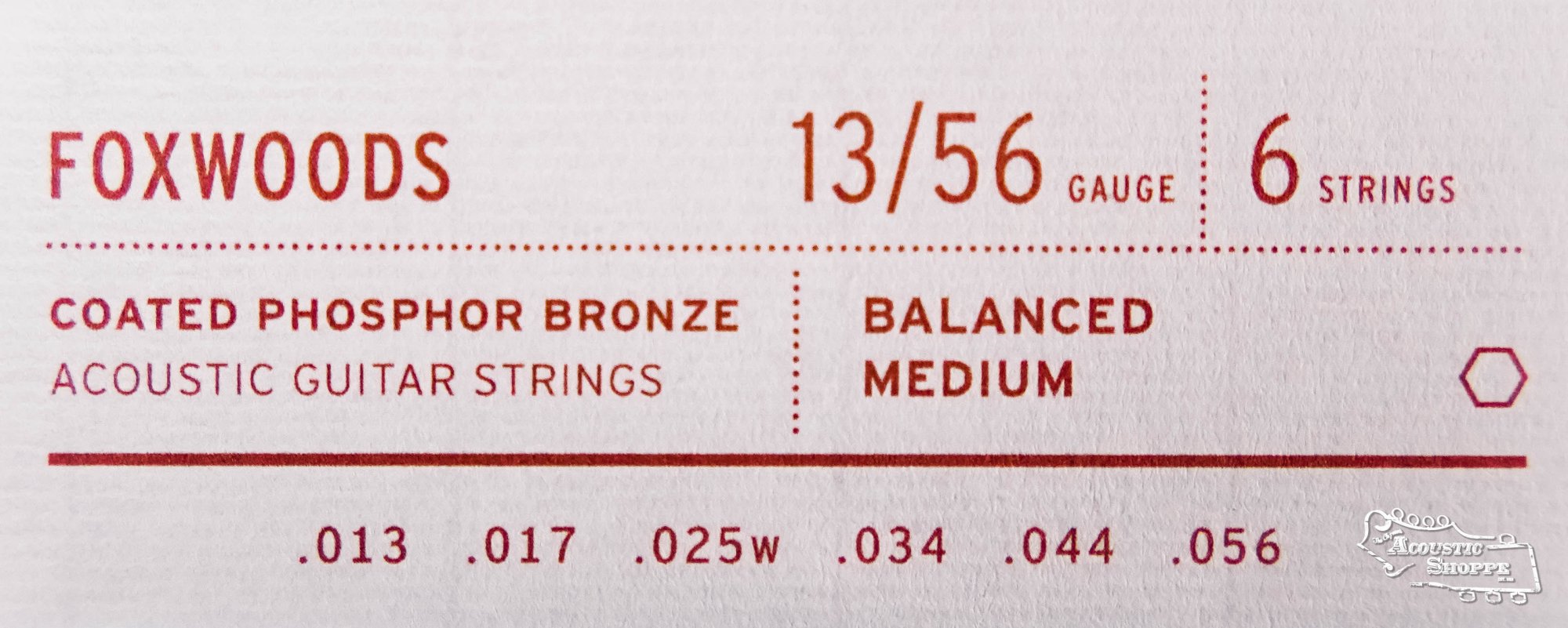 Red text on white shows specs for Stringjoy Foxwoods Medium Gauge (13-56) Coated Phosphor Bronze Acoustic Guitar Strings: 6-string set, gauges .013, .017, .025w, .034, .044, and .056. Brand: Stringjoy.