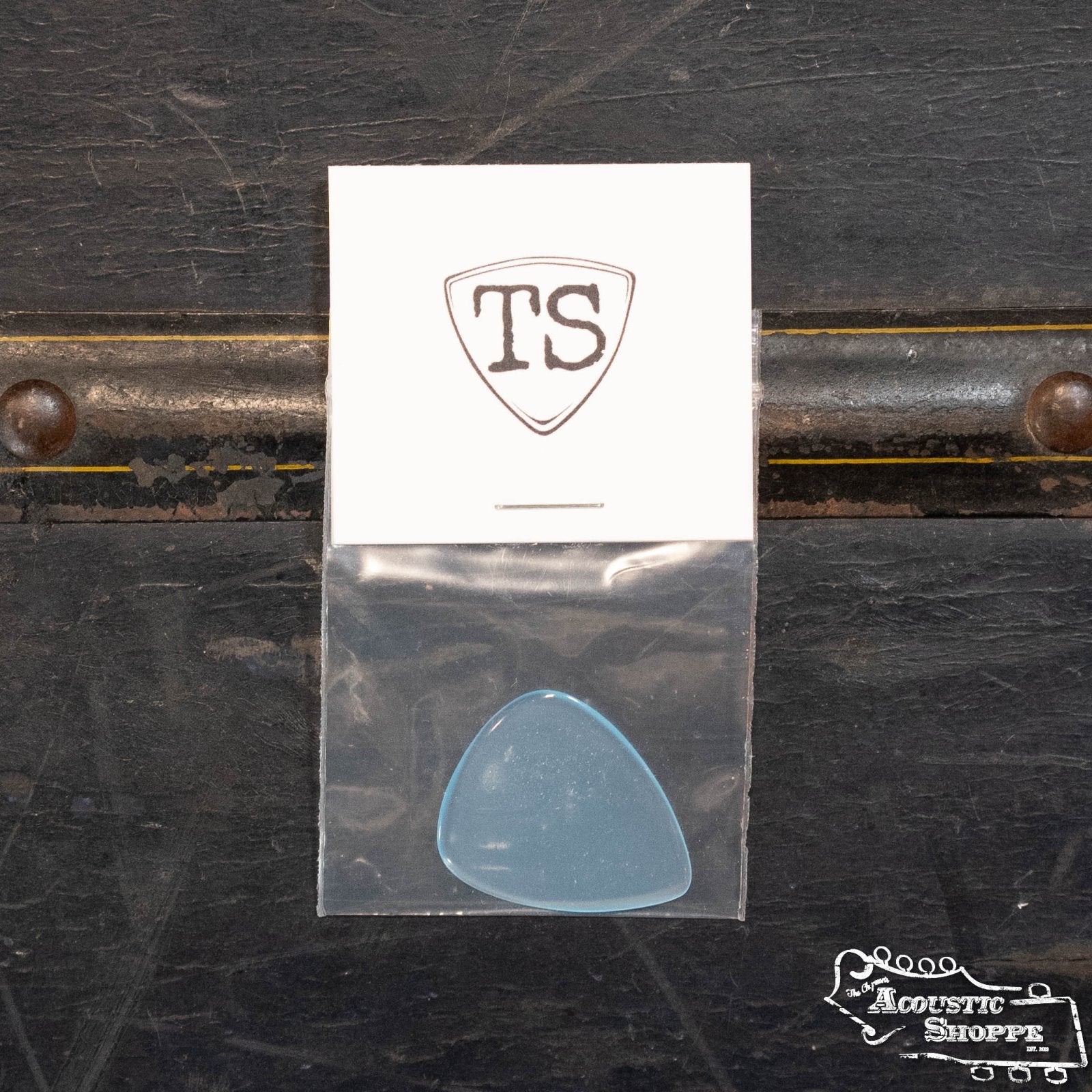 A ToneSlabs Tear Drop Guitar Pick - 1.4 mm, ideal for acoustic instrument enthusiasts and fans of ToneSlabs accessories.