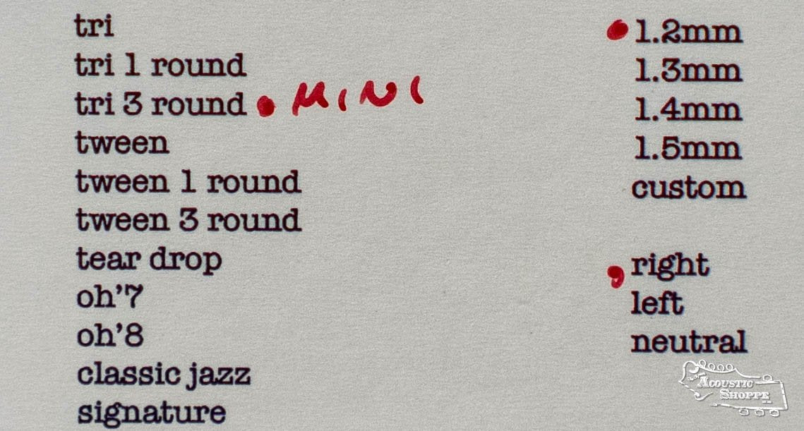 A typed list shows guitar pick shapes and sizes, with “MINI” handwritten beside "tri 3 round" and “1.2mm guitar pick” circled. A comma before “right” is also circled. The image is watermarked with the ToneSlabs brand name and features the Mini Tri 3Round - 1.2mm pick.