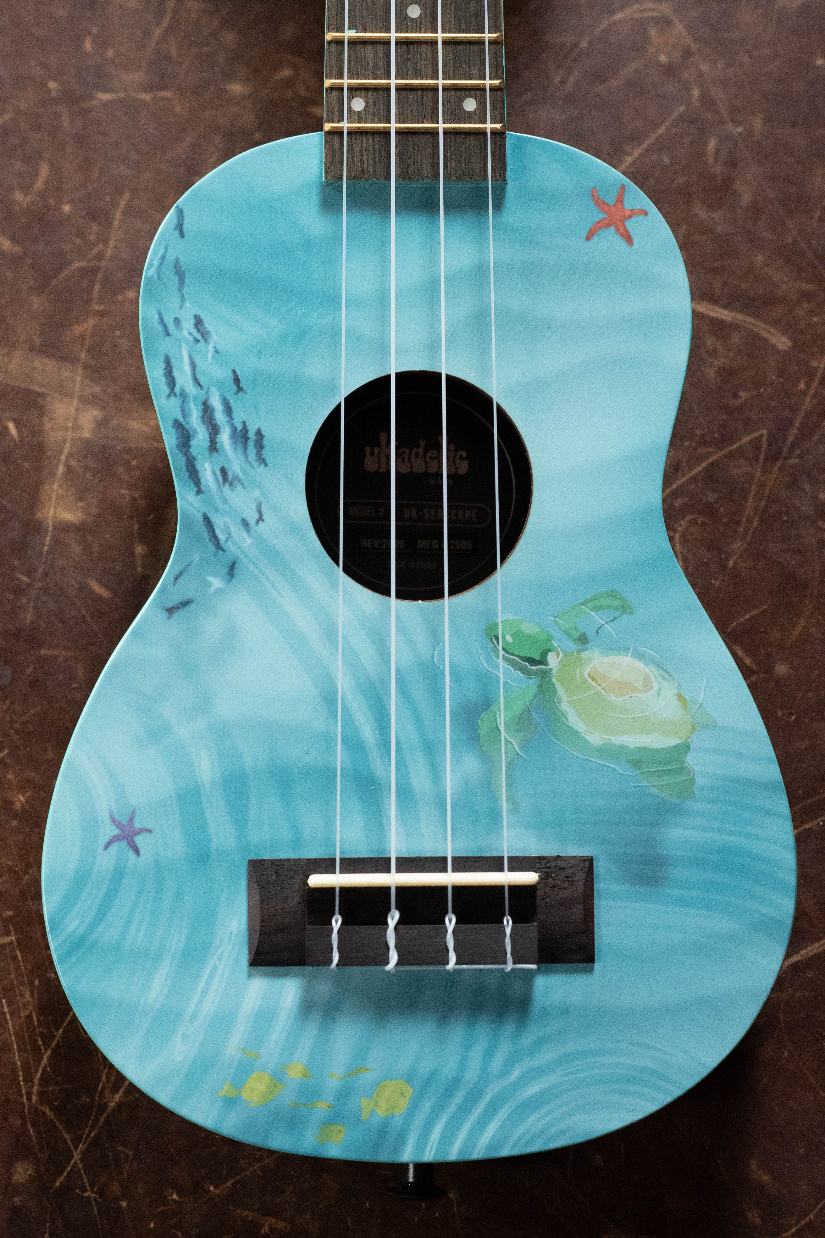 Soprano ukulele with blue seascape design featuring sea turtles, starfish, and coral patterns. - Ukadelic Seascape Soprano Ukulele - Kala Brand - Default Title