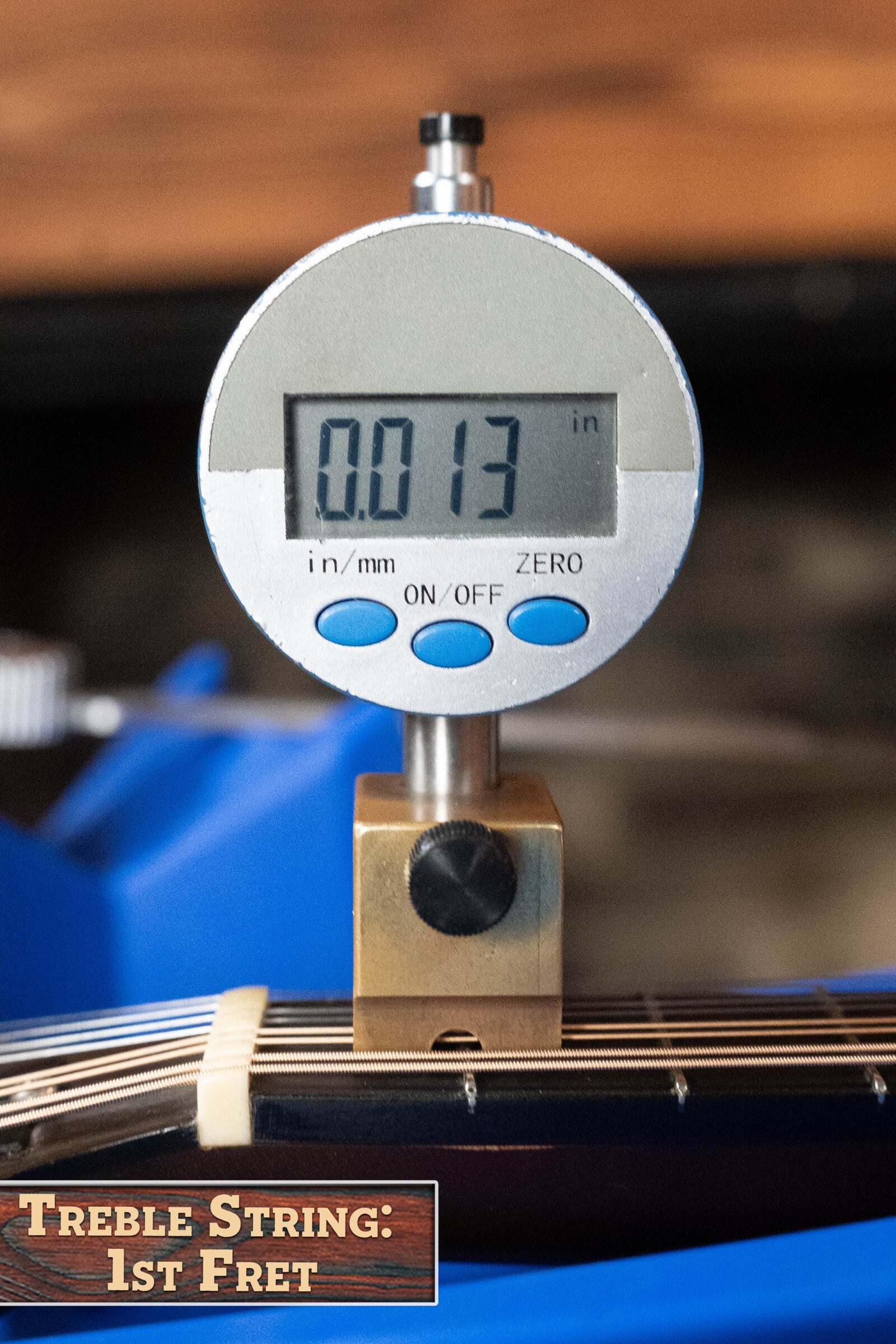 A digital gauge shows 0.013 above the treble string at the 1st fret, echoing the precision setup of this (Used) 2003 Gibson Mastermodel A9 Spruce/Maple Mandolin #7040. Treble String: 1st Fret is displayed in the lower left corner.