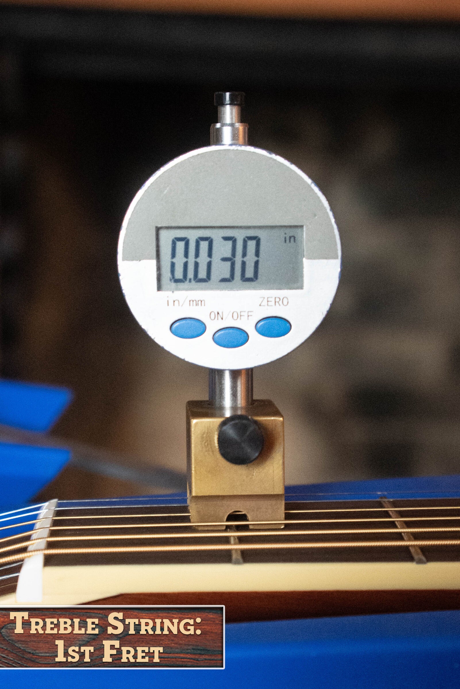 A digital gauge shows 0.030 in for the treble string height at the 1st fret of a Yamaha FG830 Spruce/Laminate Rosewood Natural Dreadnought Acoustic Guitar #0562. A label below reads: Treble String: 1st Fret.
