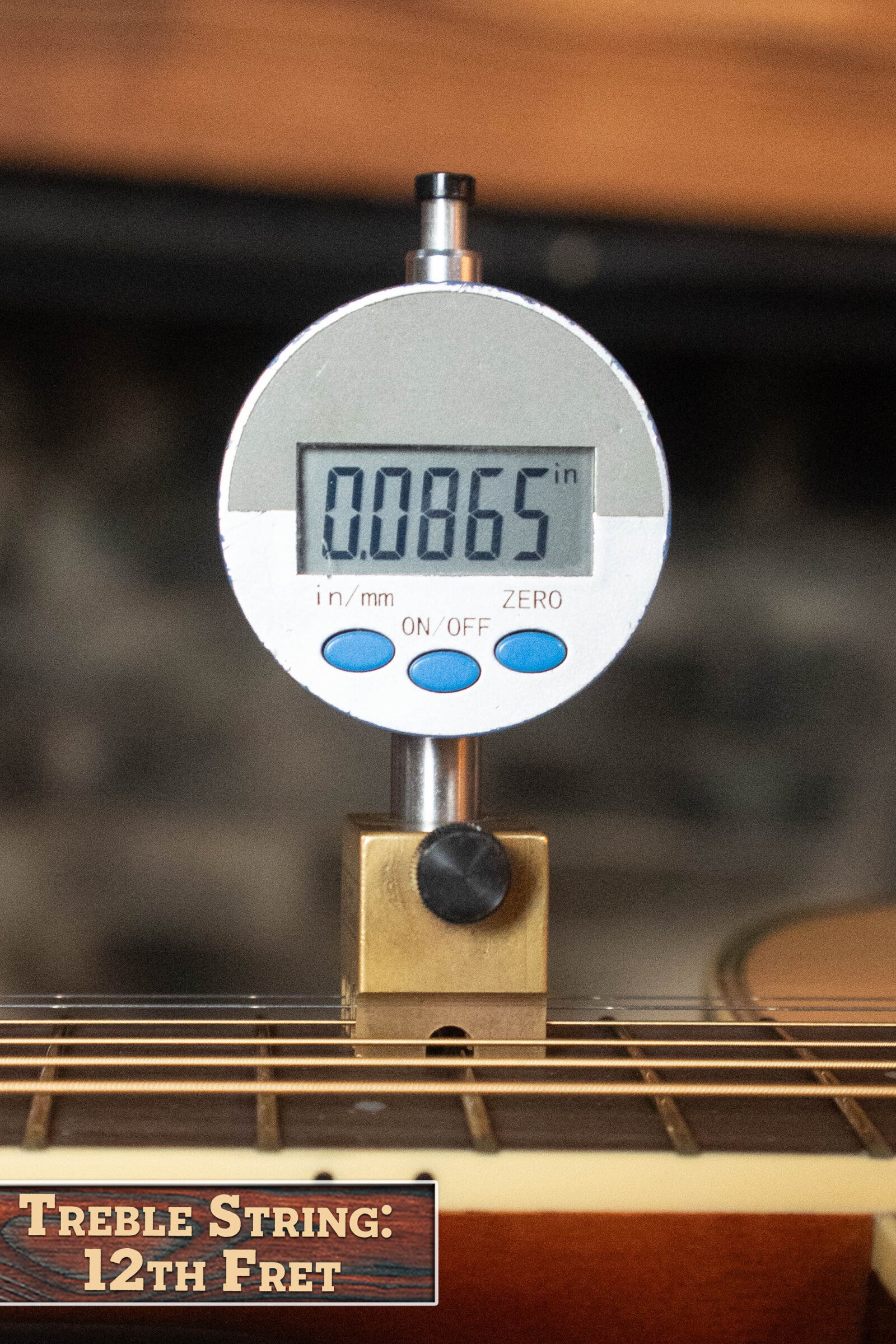 A digital gauge reads 0.0865 inches on the 12th fret of a Yamaha FG830 Spruce/Laminate Rosewood Natural Dreadnought Acoustic Guitar #0562. A label at the bottom left says, Treble String: 12th Fret.