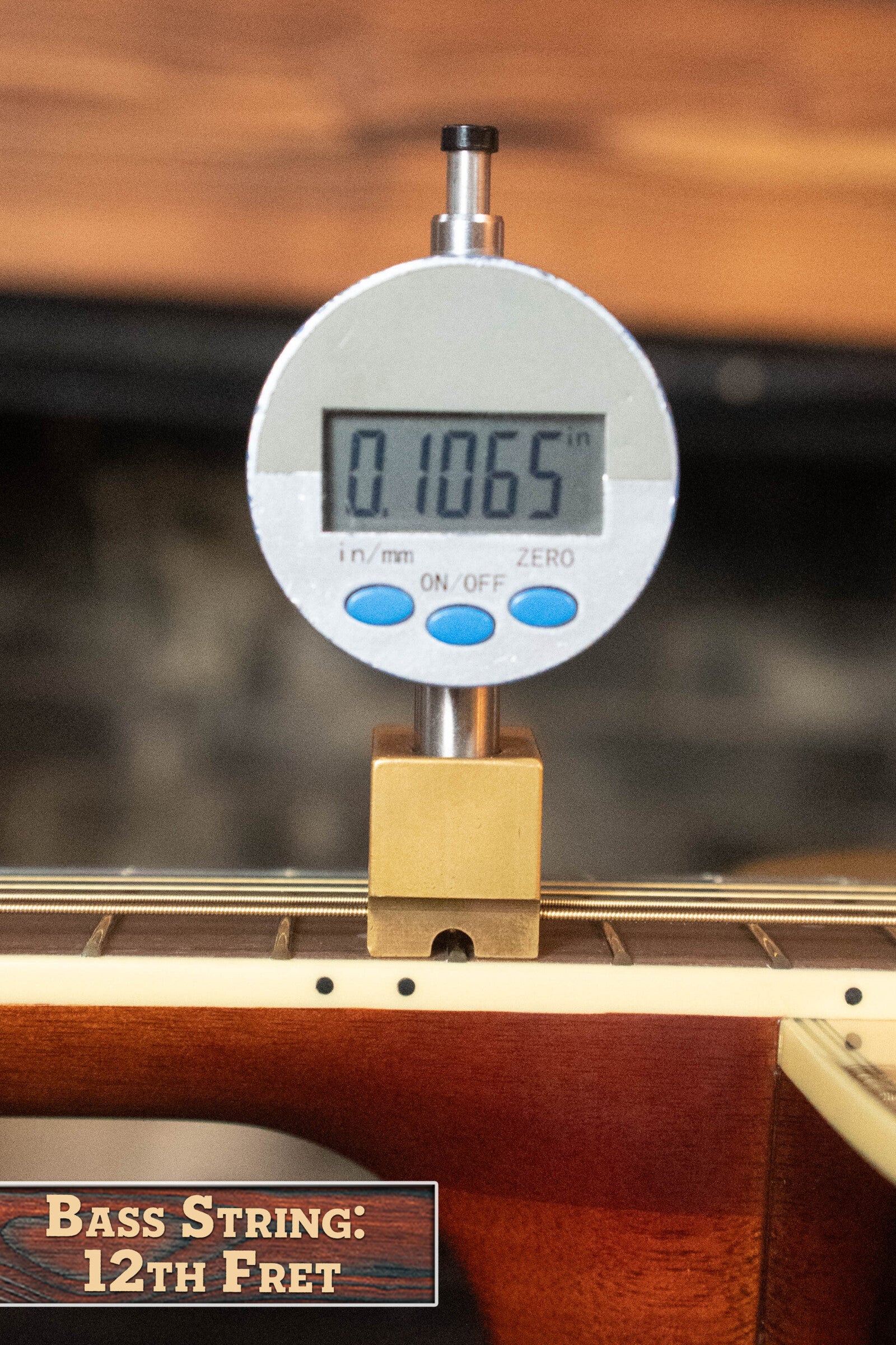 A digital caliper shows 0.1065 inches string height above the 12th fret on a Yamaha FG830 Spruce/Laminate Rosewood Natural Dreadnought Acoustic Guitar #0600. A bottom label reads: Bass String: 12th Fret.