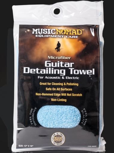 The Music Nomad Microfiber Guitar Detailing Cloth (MN202) is a lint-free towel for acoustic and electric guitars, featuring blue fabric in clear packaging with a black and yellow label—ideal for cleaning your gear.