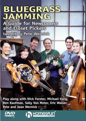 Five smiling people with bluegrass instruments pose in a studio, promoting Homespun Bluegrass Jamming (DLWERJM21) by Homespun—a beginner-friendly DVD ideal for newcomers eager to learn and join their first bluegrass jam session.