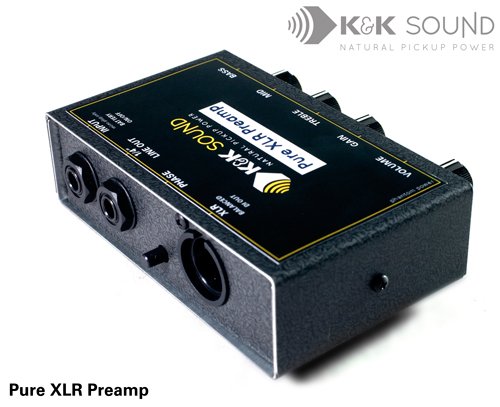 The K&K Sound Pure XLR Preamp is a black audio device for acoustic instruments with multiple input/output ports, a phase switch, and top control knobs. The K&K Sound logo appears in the background.