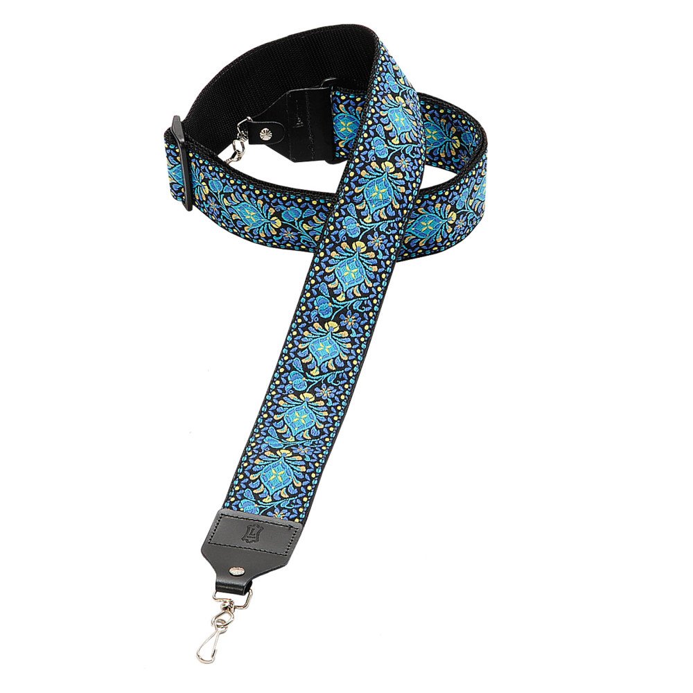 The Levys Leather M10HT-04 Hootenanny Jacquard Banjo Strap features a vibrant blue and green floral pattern, black edges, leather ends, adjustable up to 60, and metal clasps for attaching to your bag.