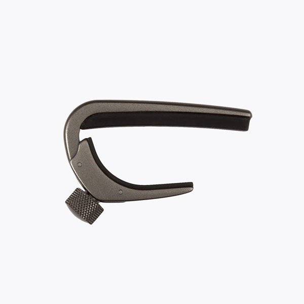 The D'Addario NS Capo Pro PW-CP-02, a metal guitar capo with a curved top, padded clamp, and adjustable screw, is displayed against a plain white background.