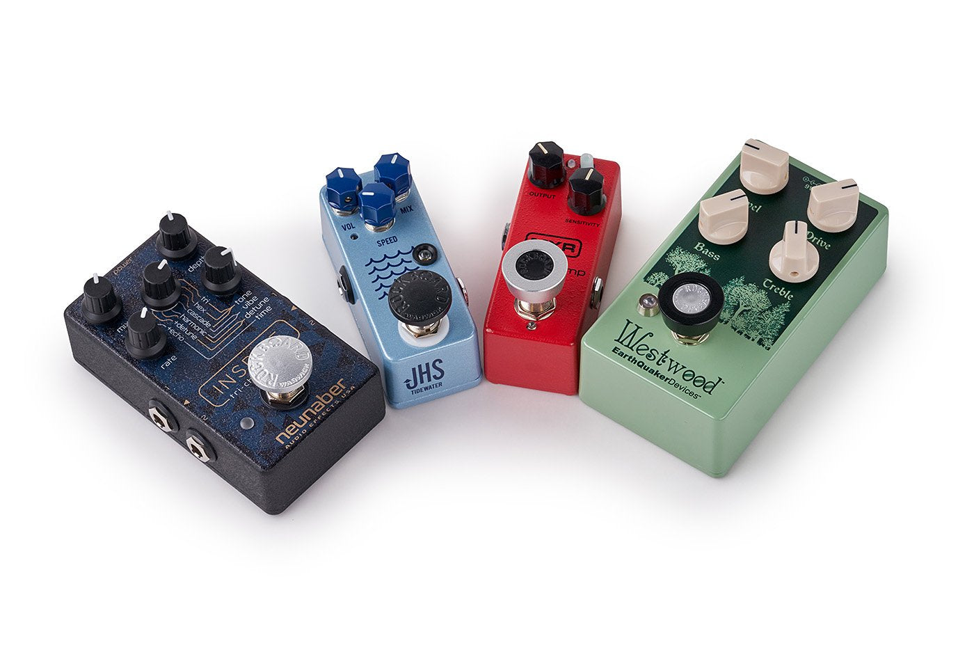 Three silver Framus & Warwick Rockboard Footswitch Topper StomPete pedals are arranged in a slight arc on a white background, each featuring distinctive knobs, toppers, and unique graphic designs.