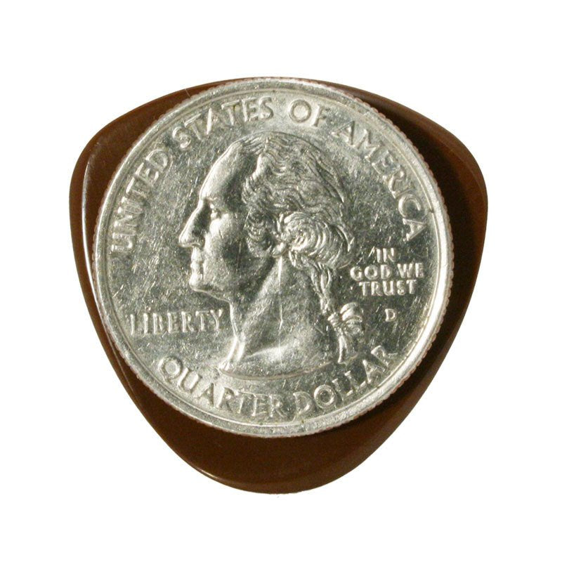 A silver U.S. quarter sits atop a brown BlueChip Picks (SR40) guitar pick from BlueChip, set against a white background—showcasing Acoustic Shoppes commitment to quality craftsmanship.