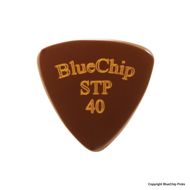 The BlueChip Picks (STP40) by BlueChip is a brown, triangular pick with rounded edges and gold lettering—an outstanding addition to any acoustic music accessory collection.