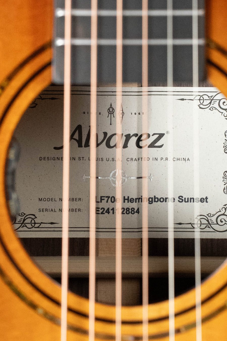 Alvarez Laureate Series LF70e acoustic guitar with herringbone Sitka spruce top and rosewood body, close-up on soundhole. - Alvarez Laureate Series LF70e Herringbone Sitka/Rosewood Sunset OM Guitar w/LR Baggs Hifi Pickup #2884 - Default Title