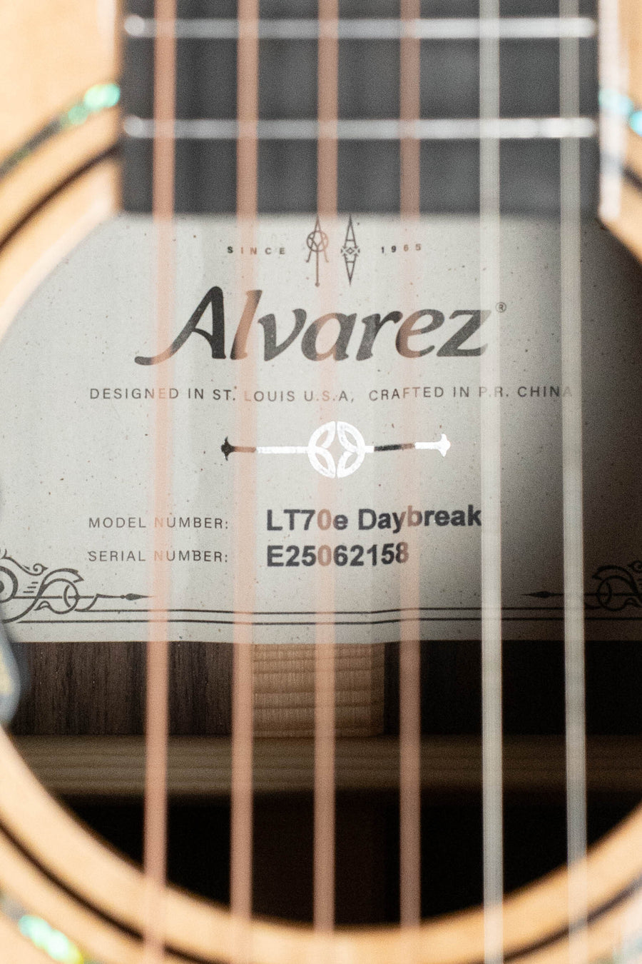 Alvarez OOO acoustic guitar close-up showing natural Daybreak Sitka top, rosewood rosette, and LR Baggs Hifi pickup label. - Alvarez Laureate Series LT70e Daybreak Sitka/Rosewood OOO Guitar w/LR Baggs Hifi Pickup #2158 - Default Title