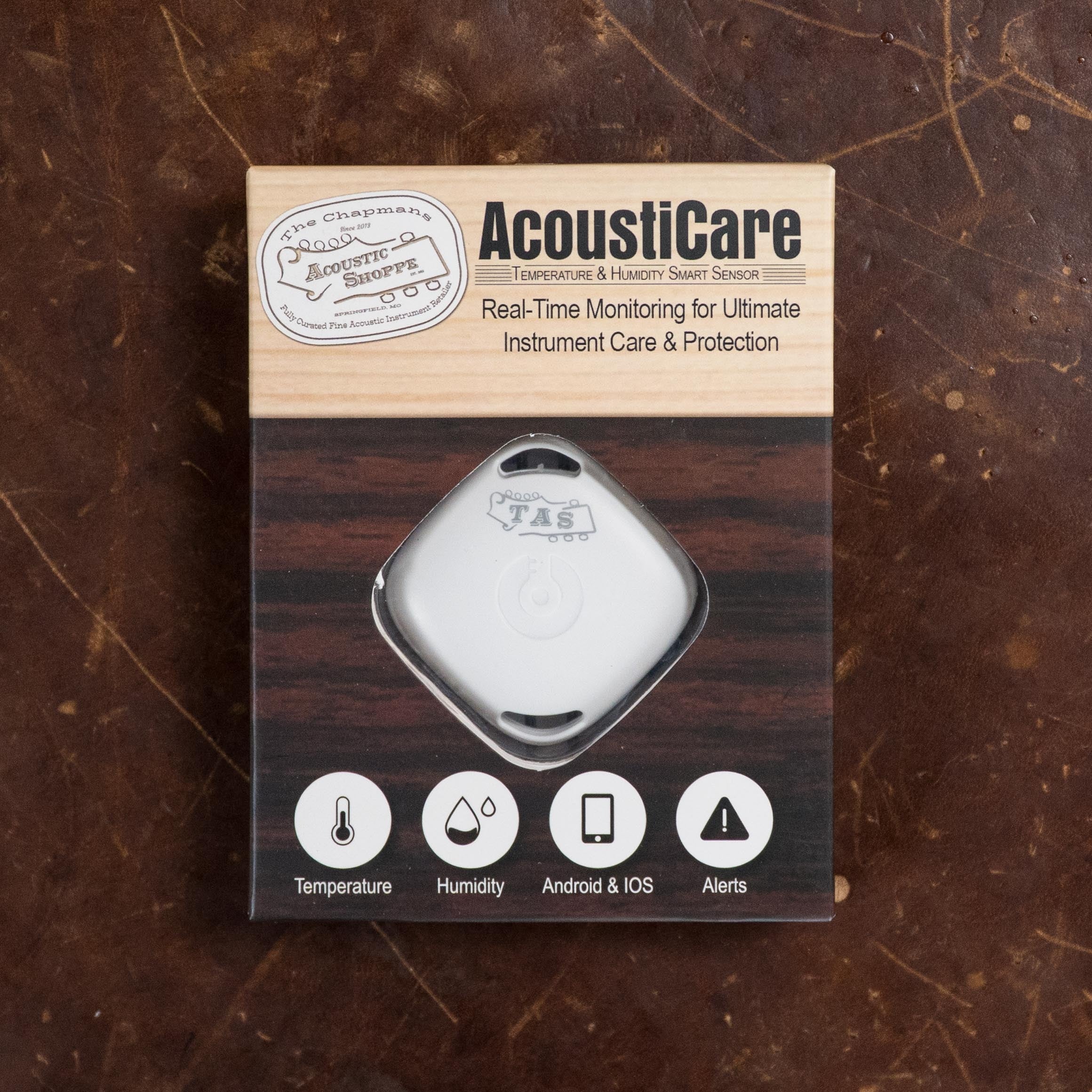 Keep your Atkin Guitars White Rice Baked Sitka/Rosewood Dreadnought Acoustic Guitar #3497 safe with the AcoustiCare Temperature & Humidity Smart Sensor—features easy app alerts, and icons for temperature, humidity, Android/iOS compatibility.