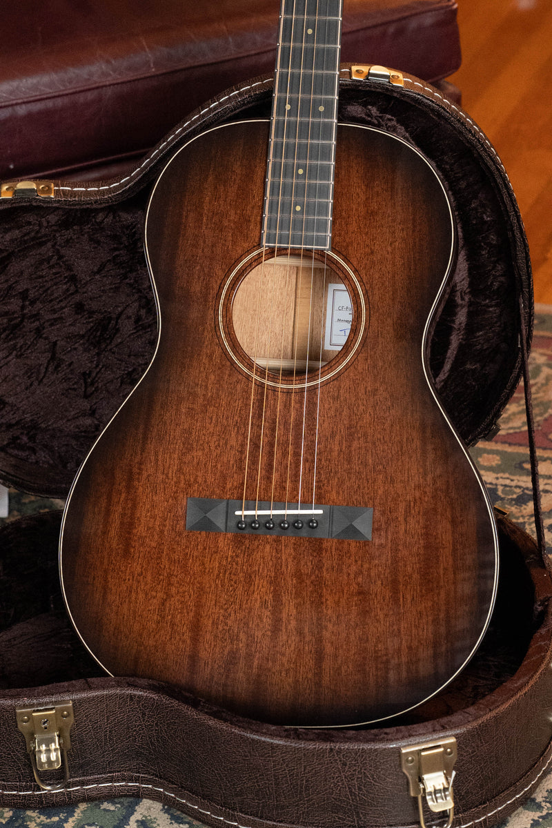 Bedell Classic Folk All Honduran Mahogany Parlor Guitar, front view in a hardshell case.