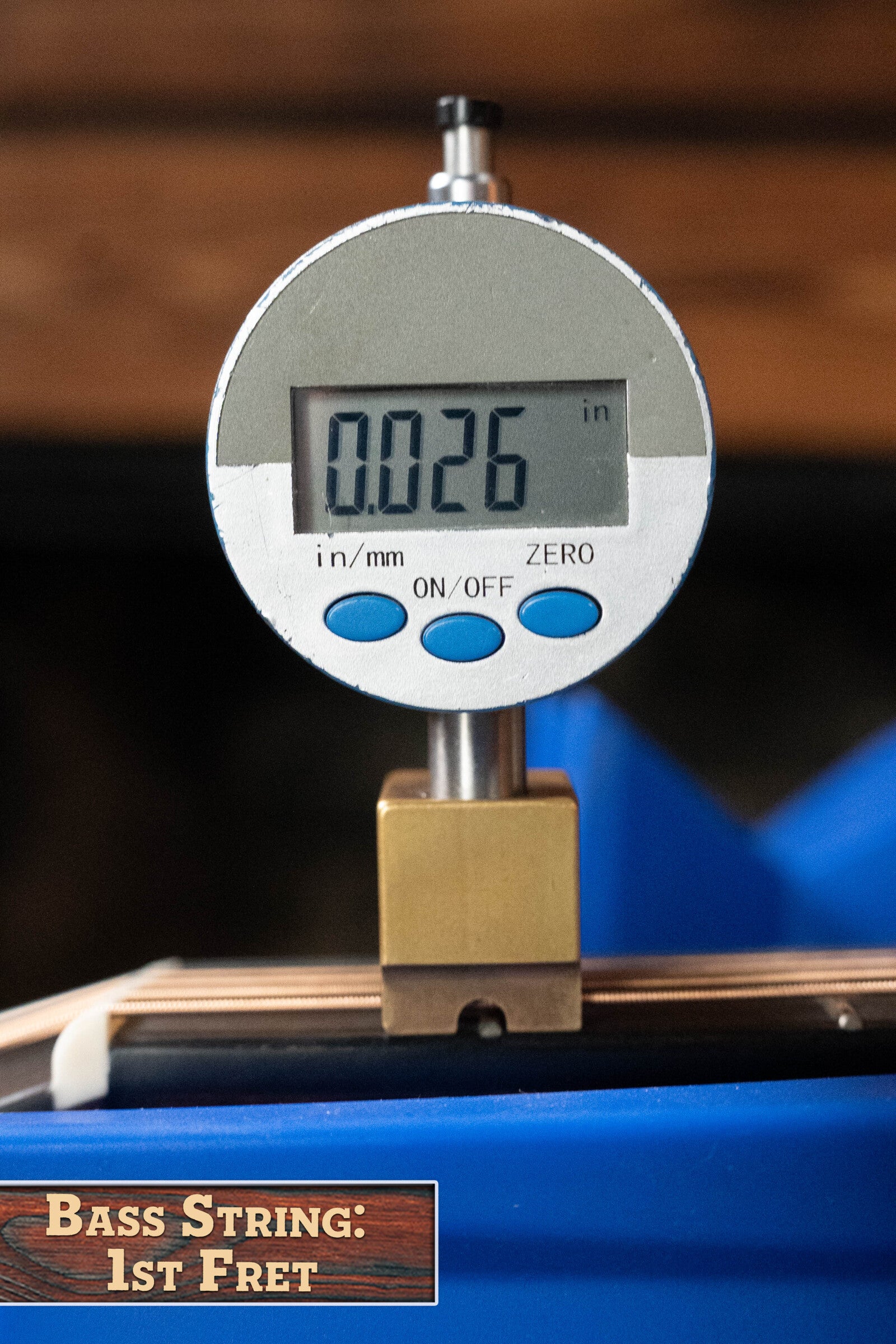 A digital gauge shows 0.026" for bass string height above the 1st fret, labeled "Bass String: 1st Fret"—offering precision comparable to a Bourgeois D Vintage/TS Touchstone Series Dreadnought Acoustic Guitar #7014 setup.