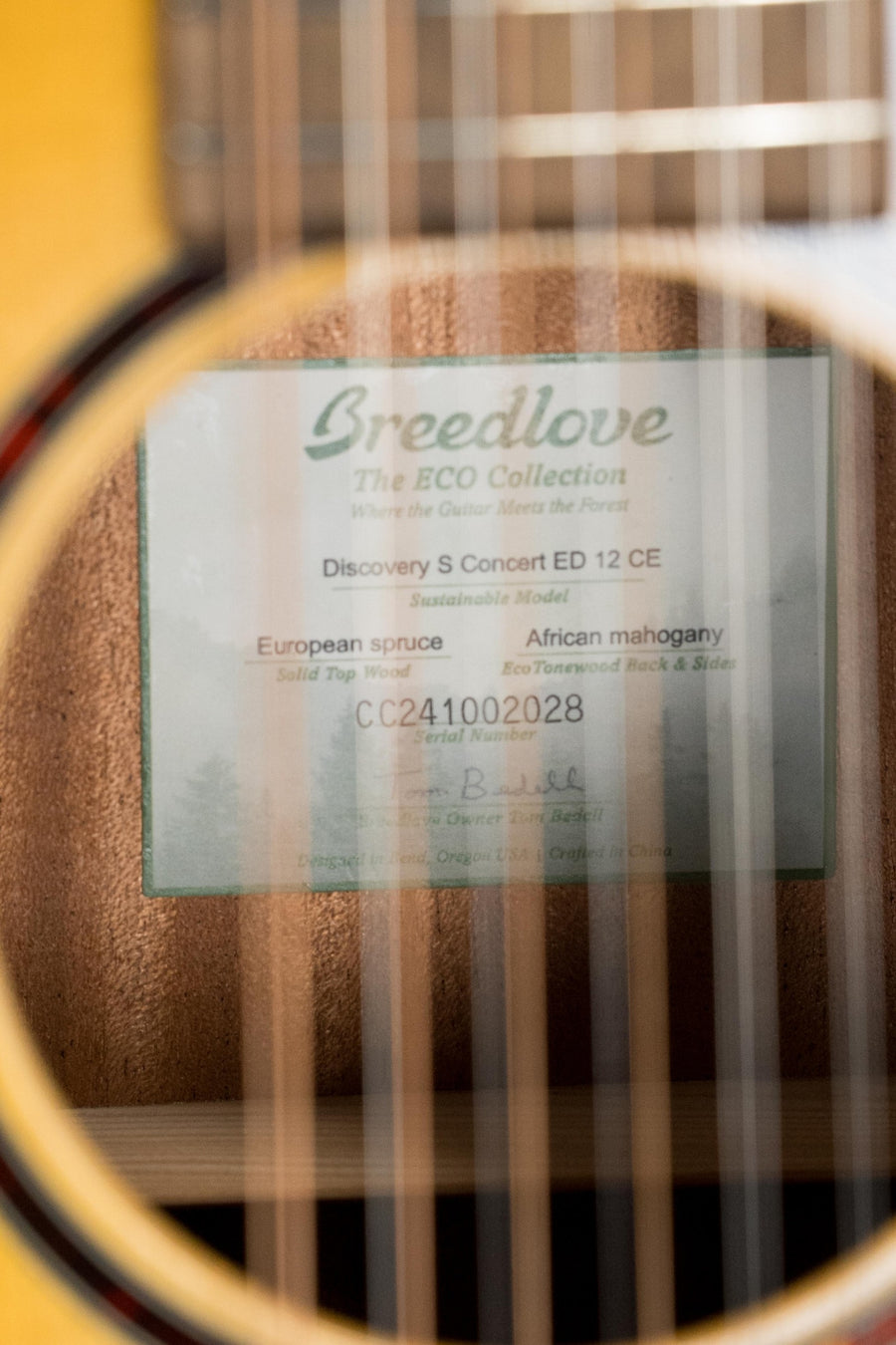 Breedlove Discovery Series 12-string cutaway concert guitar with spruce top and mahogany edgeburst finish visible through. - Breedlove Discovery Series Spruce/Mahogany Edgeburst 12 String Cutaway Concert Guitar w/Electronics #2028 - Default Title