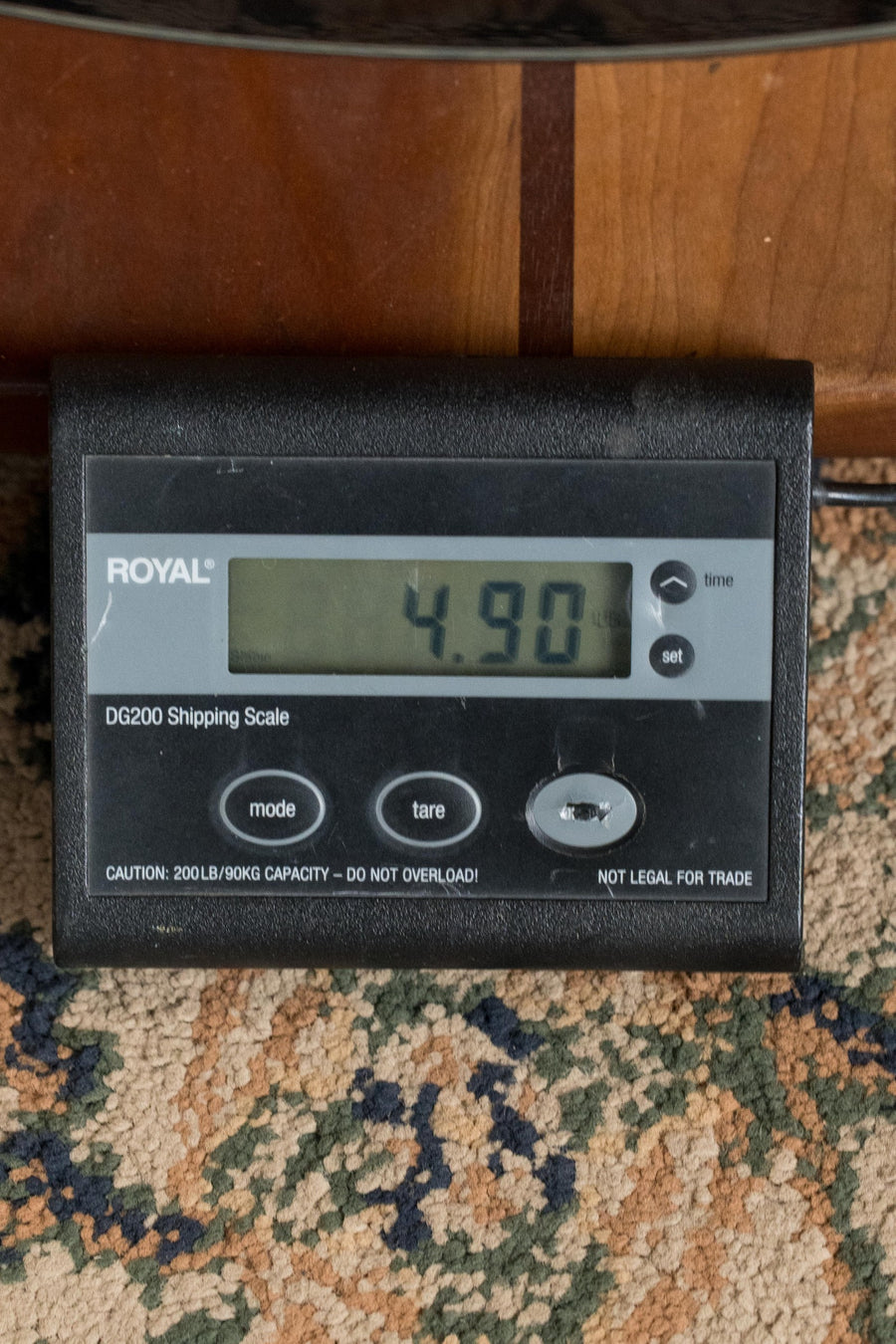 Black digital shipping scale displaying 4.90 lbs on a patterned carpet background. - Breedlove Discovery Series Spruce/Mahogany Edgeburst 12 String Cutaway Concert Guitar w/Electronics #2028 - Default Title