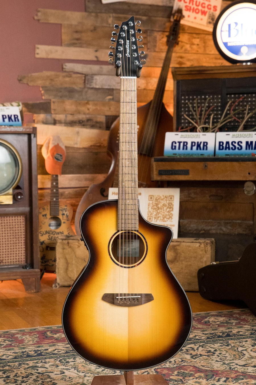 Breedlove 12-string cutaway concert guitar with spruce top and mahogany edgeburst finish, electronics, and light wood. - Breedlove Discovery Series Spruce/Mahogany Edgeburst 12 String Cutaway Concert Guitar w/Electronics #2028 - Default Title
