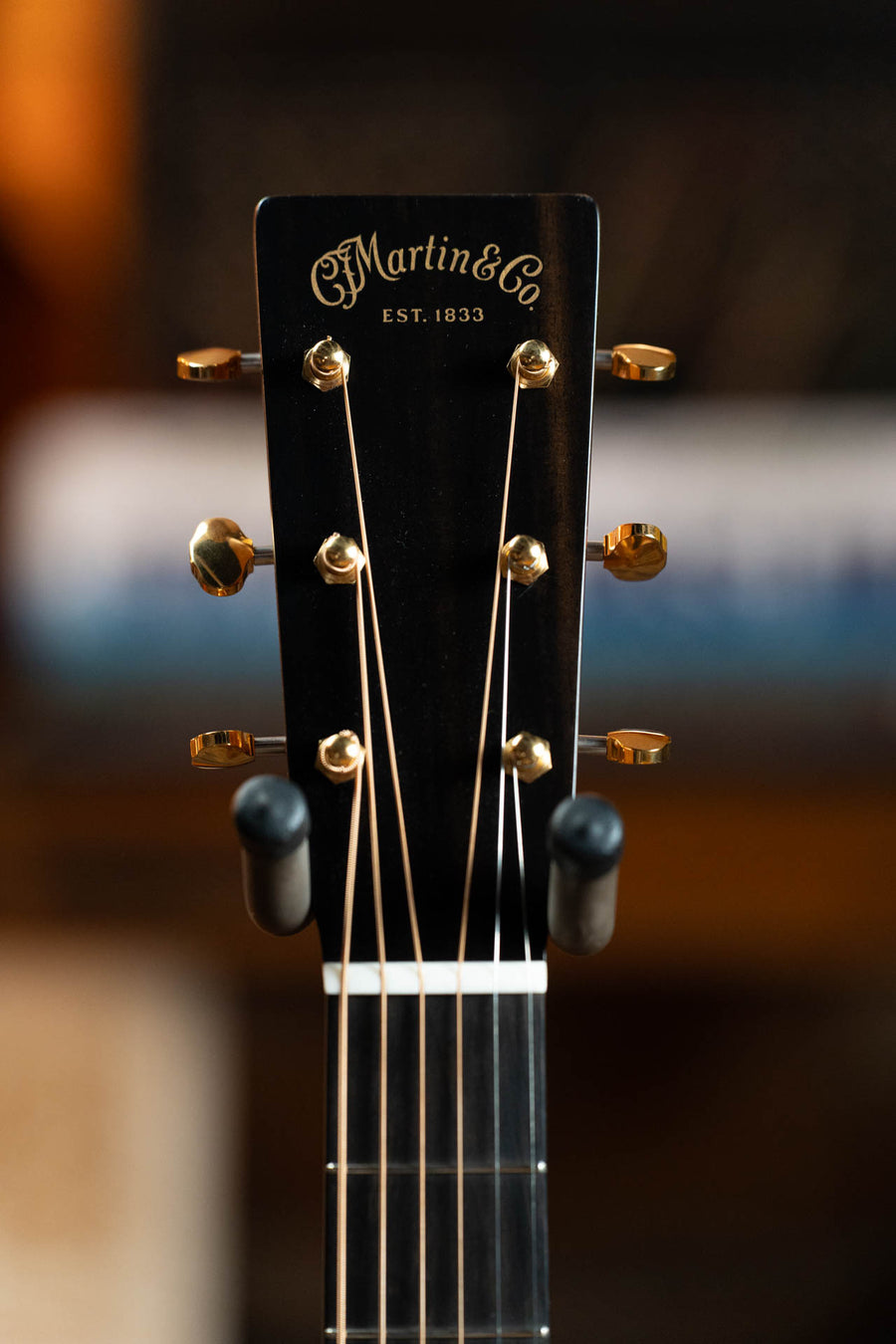 Martin & Co black acoustic guitar headstock with gold tuning pegs and white nut. - Martin Custom Shop OOO-17 Style All Flamed Mahogany 14th Fret Acoustic Guitar #6198 - Default Title
