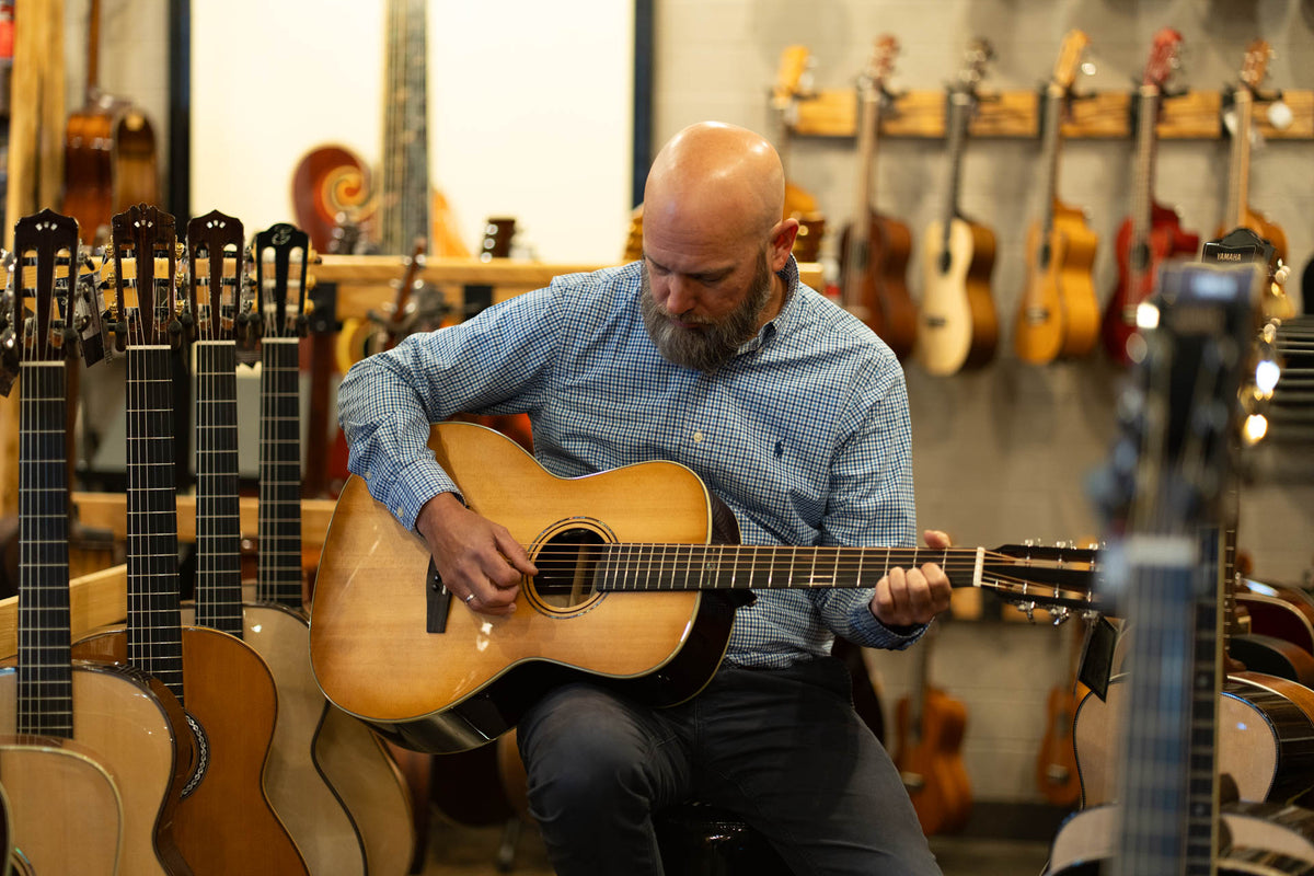 Playing guitar in The Acoustic Shoppe