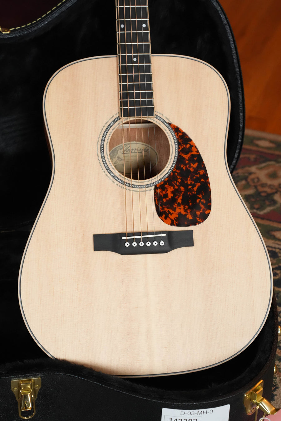 A *Dread-Not Certified Used* Larrivée D-03 Sitka/Mahogany Dreadnought Acoustic Guitar #3382 with a light solid Sitka spruce top, tortoiseshell pickguard, six strings, and plush-lined black case from Larrivée.