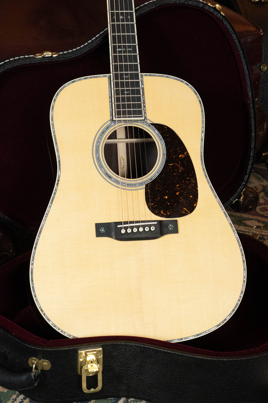 Martin D-42 dreadnought acoustic guitar with spruce top and East Indian rosewood back and sides in open black hardshell case. - *Dread-Not Certified Used*  Martin D-42 Spruce/East Indian Rosewood Dreadnought Acoustic Guitar #8810 - Default Title