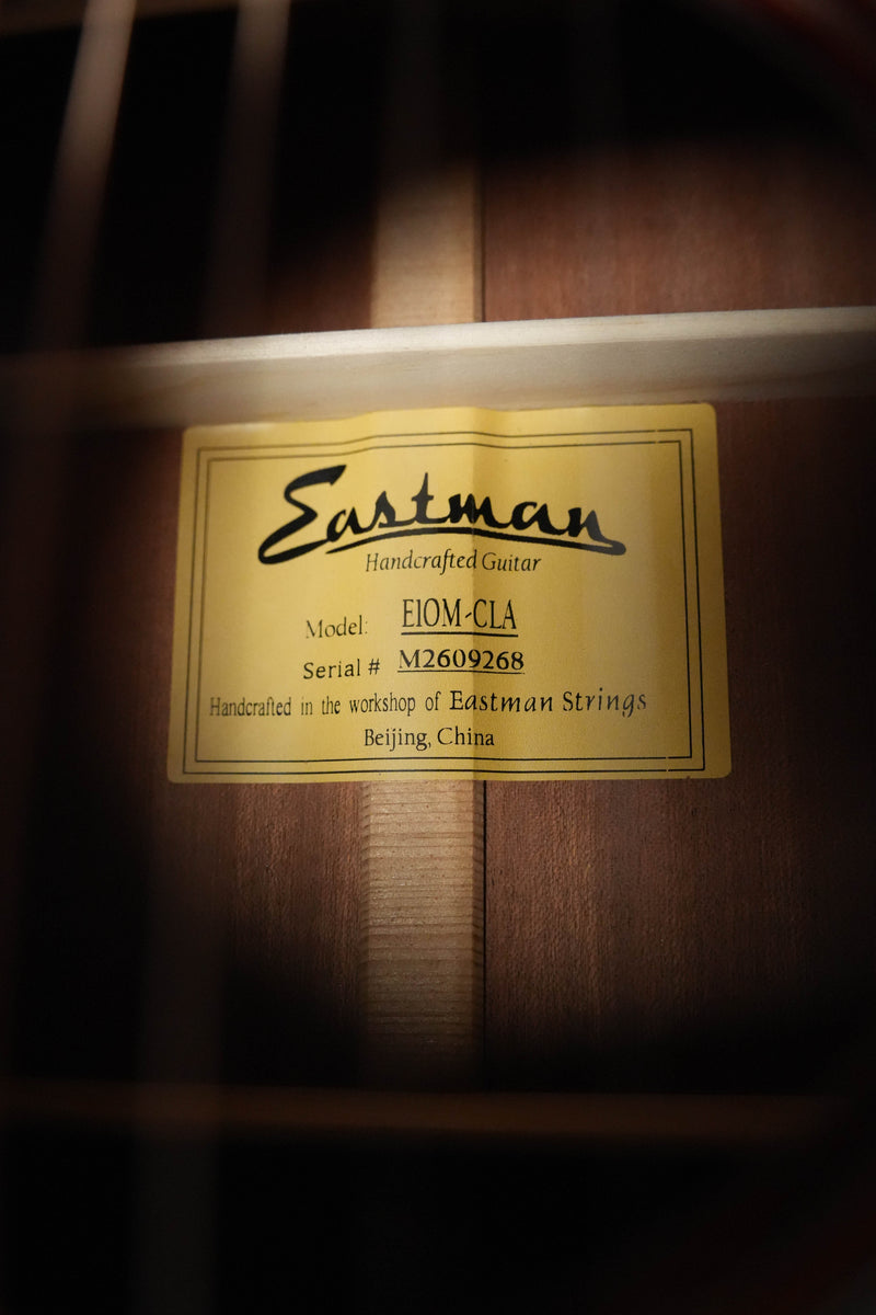 Close-up of the label inside an Eastman Guitars E1OM-CLA All Solid Sitka/Sapele Classic Finish Orchestra Model Acoustic Guitar #9268, handcrafted in Beijing, China.