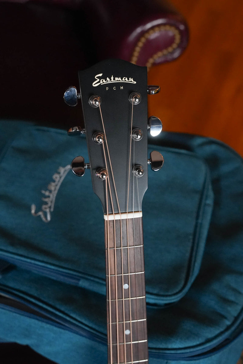 Eastman PCH2-OM-CLA Classic Finish Orchestra Model: front view of headstock and neck with matte finish.