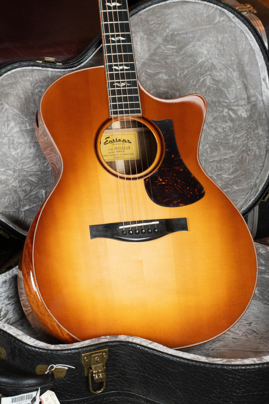 A *Dread-Not Certified Used* Eastman AC522CE-GB Goldburst Grand Auditorium Guitar by Eastman Guitars, with European Spruce/Mahogany body, cutaway, glossy finish, tortoiseshell pickguard, LR Baggs pickup, and hard case.