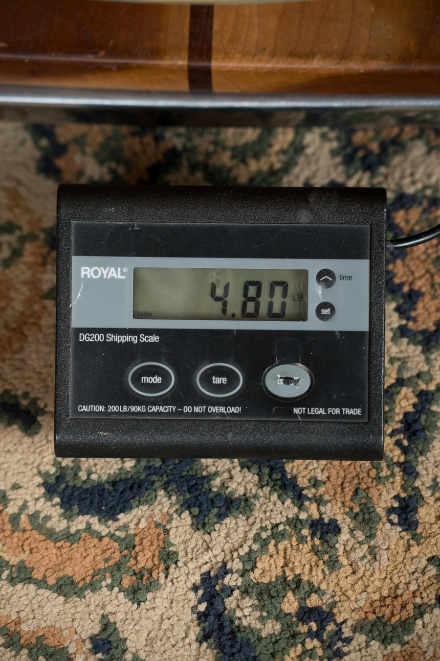 Digital scale displaying 4.80 weight on patterned carpet background. - Eastman AC630-BD Engelmann Spruce/Flamed Maple Blonde Jumbo Acoustic Guitar #5381 - Default Title