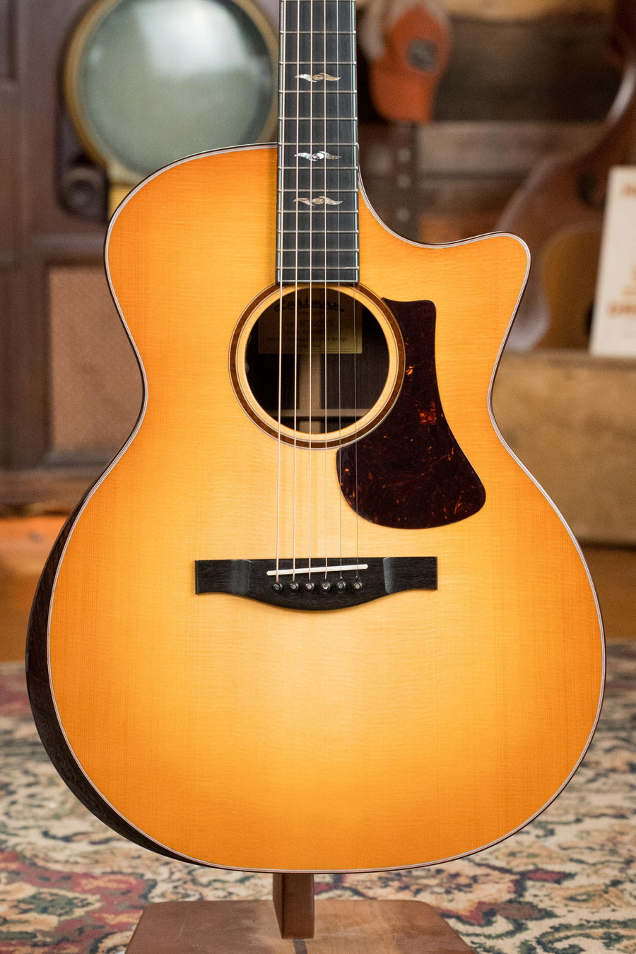 Grand auditorium acoustic guitar with Dakota fade finish, cutaway body, rosewood bridge, and black pickguard. - Eastman AC722CE-DF European Spruce/Rosewood Dakota Fade Finish Grand Auditorium  w/ LR Baggs Pickup #6872 - Default Title