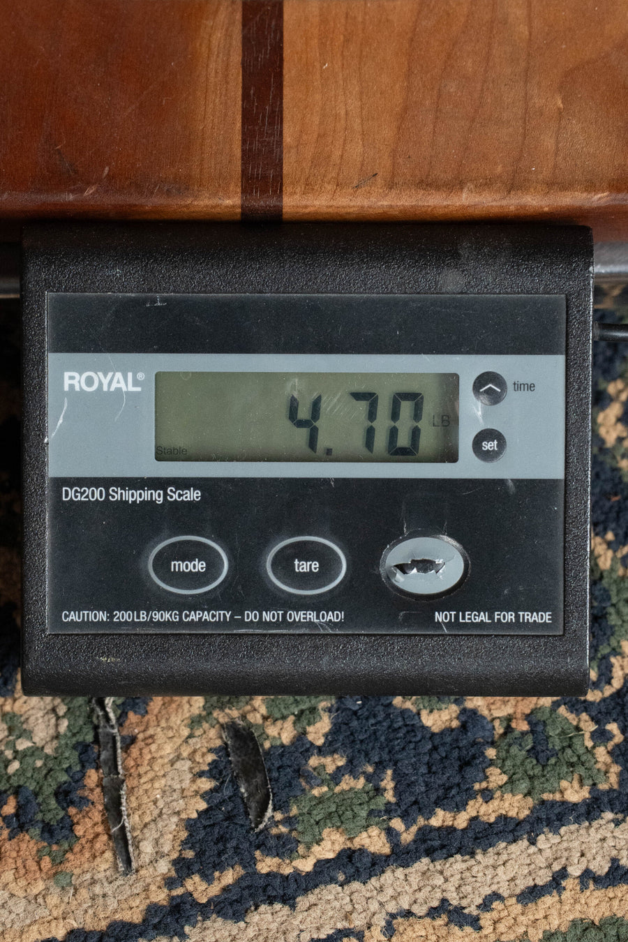 Digital scale display showing a weight of 4.70 pounds on a patterned carpet background. - Eastman E20D-TC Thermo-Cured Adirondack/Rosewood Dreadnought Acoustic Guitar #7316 - Default Title