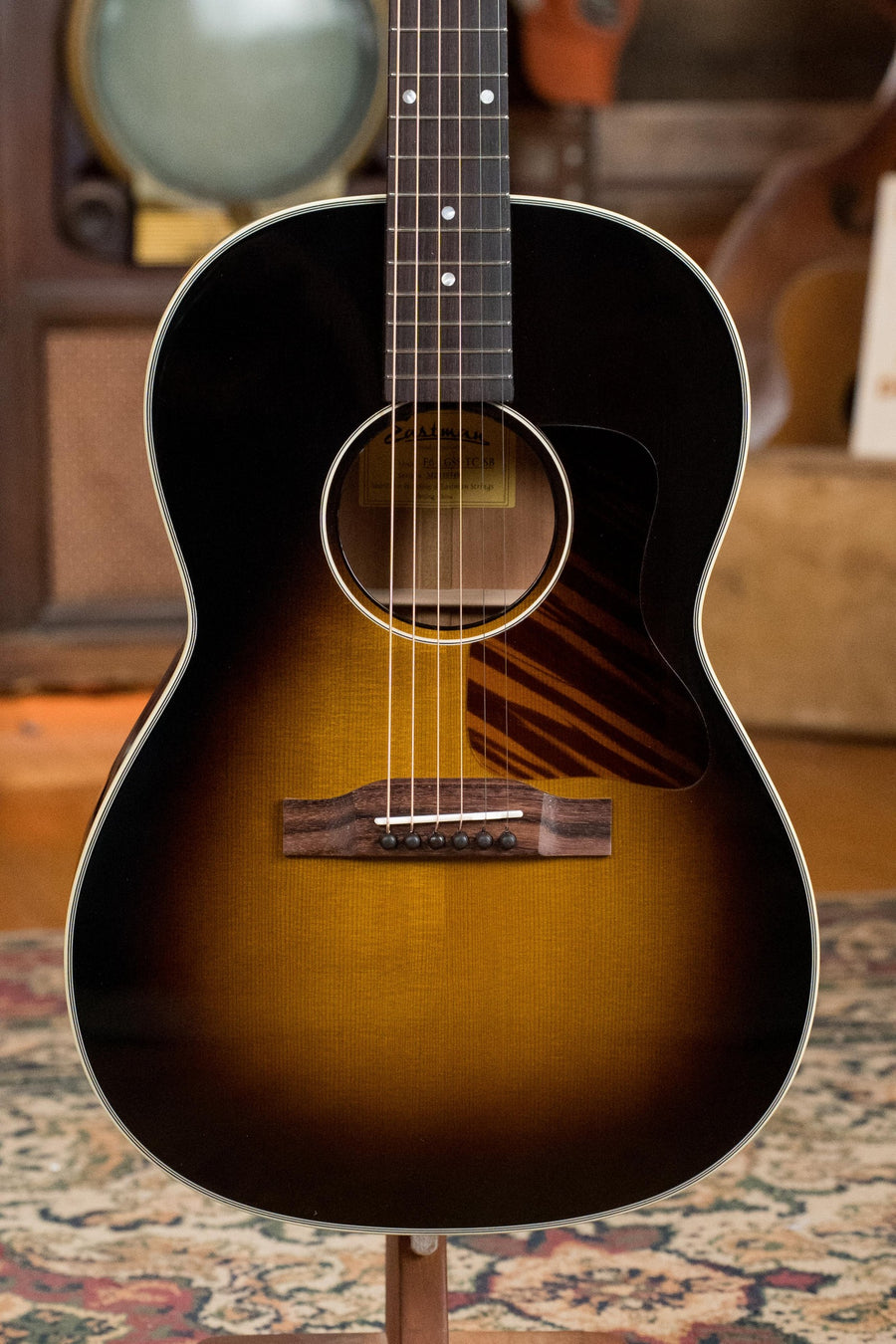 Sunburst LG-style acoustic guitar with Sitka spruce top, mahogany sides, slope shoulder body, and rosewood fingerboard. - Eastman E6-LGSS-TC-SB Thermo-Cured Sitka/Mahogany LG-Style Slope Shoulder Sunburst Acoustic Guitar #9348 - Default Title