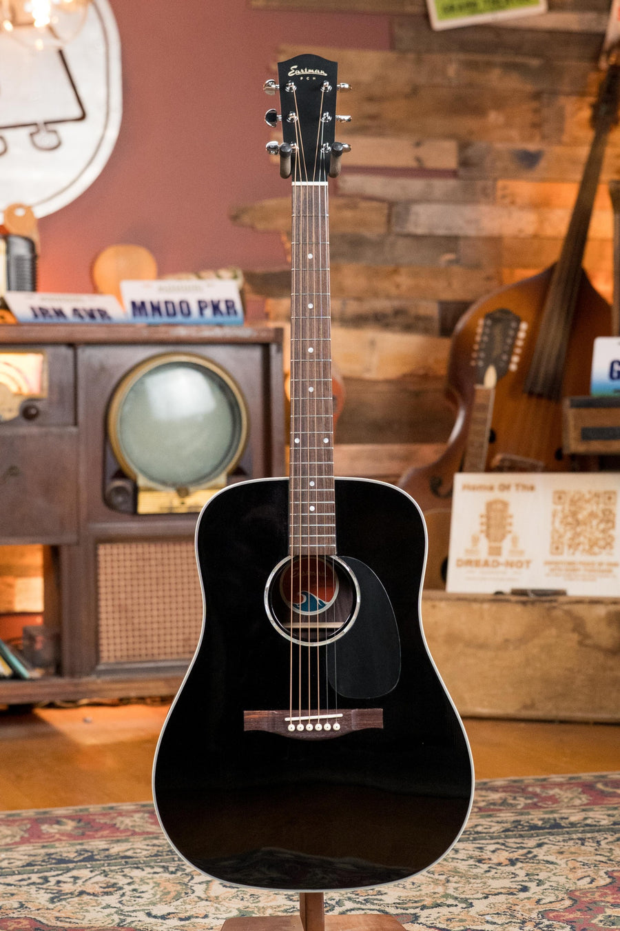 Black dreadnought acoustic guitar with solid Sitka top and laminated rosewood back and sides, chrome tuning pegs, and white. - Eastman PCH2-D-BK Solid Sitka/Laminated Rosewood Black Top Dreadnought Acoustic Guitar #9783 - Default Title