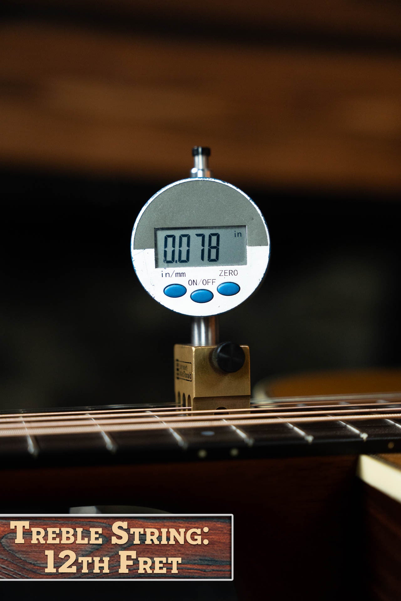 A digital gauge shows the treble string height at the 12th fret as 0.078" on the Gallagher The Bluegrass Bell Torrefied Adirondack/Rosewood Dreadnought Acoustic Guitar #4408 by Gallagher Guitar Co. Label: Treble String: 12th Fret.