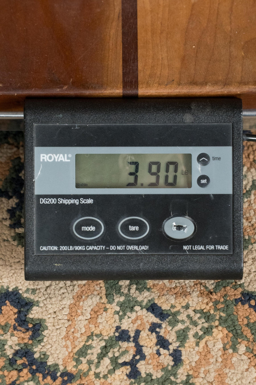 Digital shipping scale displaying 3.90 pounds weight on a carpeted surface. - Guild OM-140CE Sitka/African Mahogany Natural OM Cutaway Guitar w/Electronics #4964 - Default Title