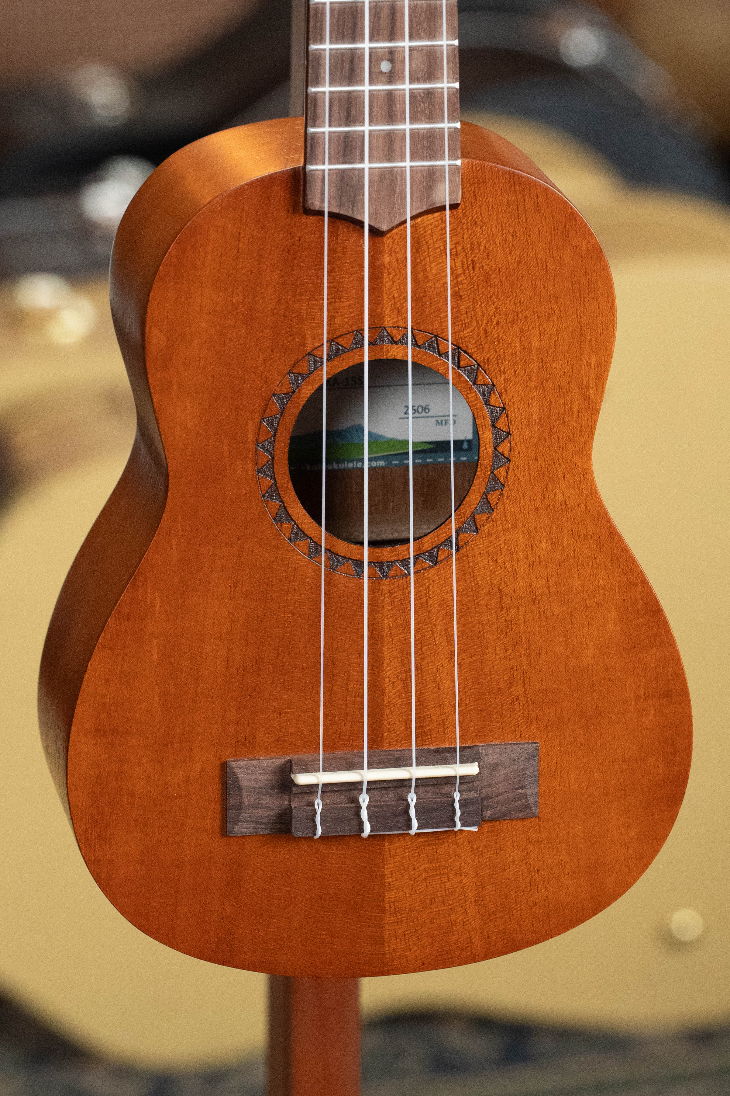 Soprano ukulele with satin mahogany body, dark wood bridge, and four white strings. - Kala KA-15S Satin Mahogany Soprano Ukulele - Default Title