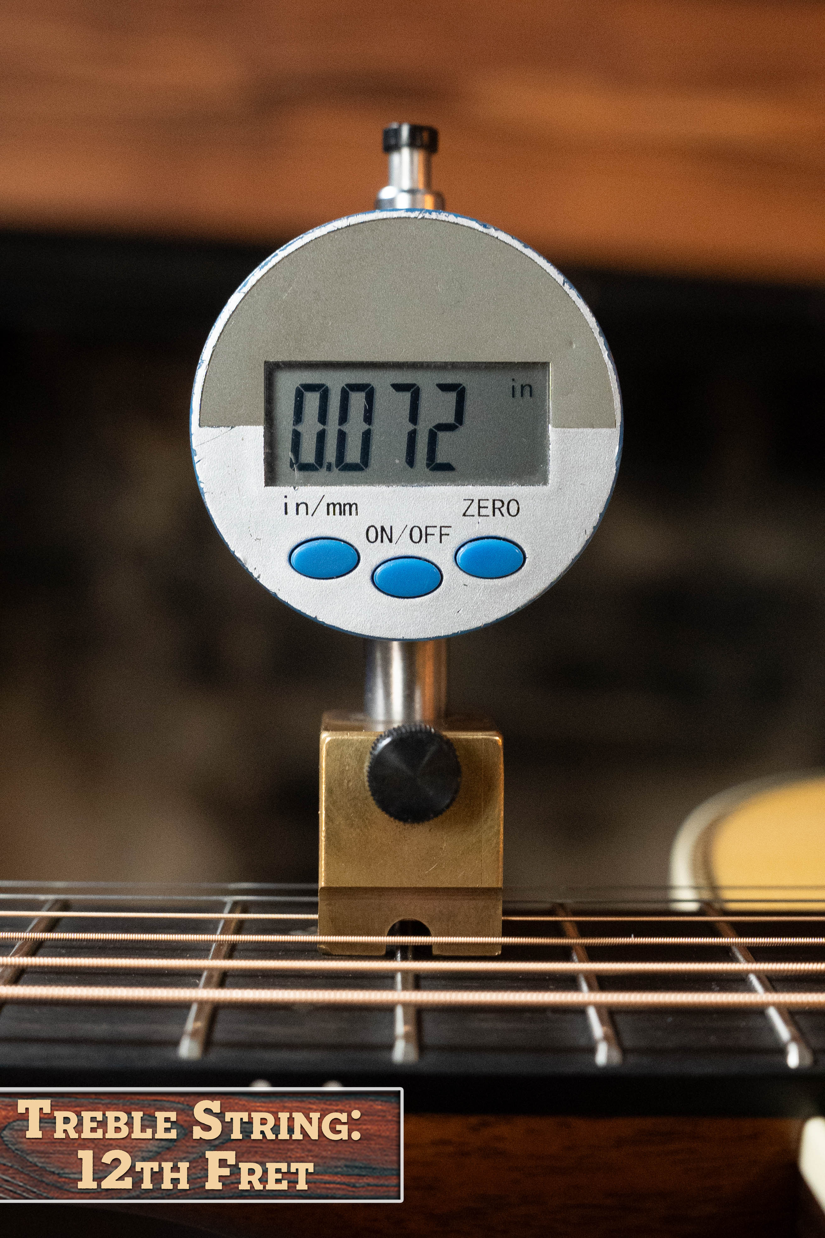 A digital gauge shows the treble string height at 0.072 inches above the 12th fret on the Martin & Co. Custom Shop HD-28 Style Spruce/Wild Grain Rosewood "D" Dreadnought #7410. Below, a label reads: Treble String: 12th Fret in bold text.