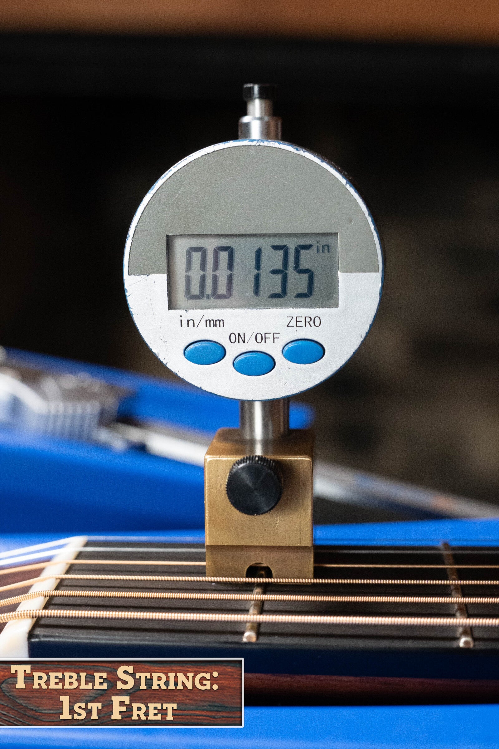 A digital gauge shows the string height at the 1st fret of a Martin & Co. Custom Shop D-18V Adirondack/Mahogany Dreadnought #6905 as 0.0135 inches, with a label reading "Treble String: 1st Fret" at the bottom.