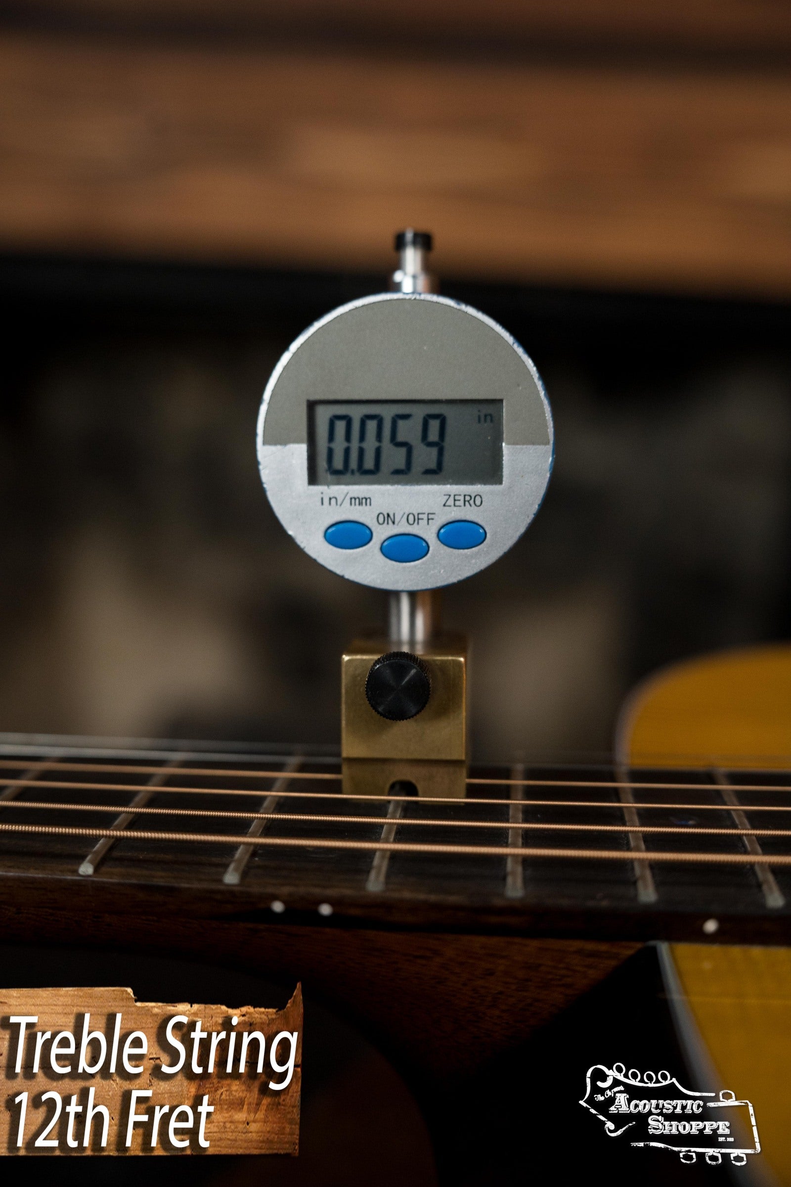 A Martin & Co. DE Retro Plus Dreadnought Guitar displays a treble string height of 0.059 inches at the 12th fret on a digital gauge, with Treble String 12th Fret and Acoustic Shoppe logos in a vintage-inspired tone setting.